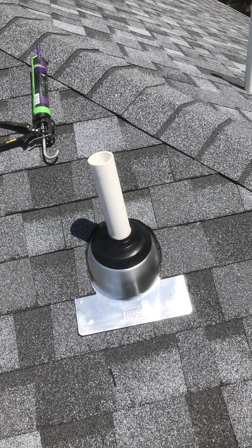 Commercial Roofing Installation using EPDM with white gutters by A Plus Exterior