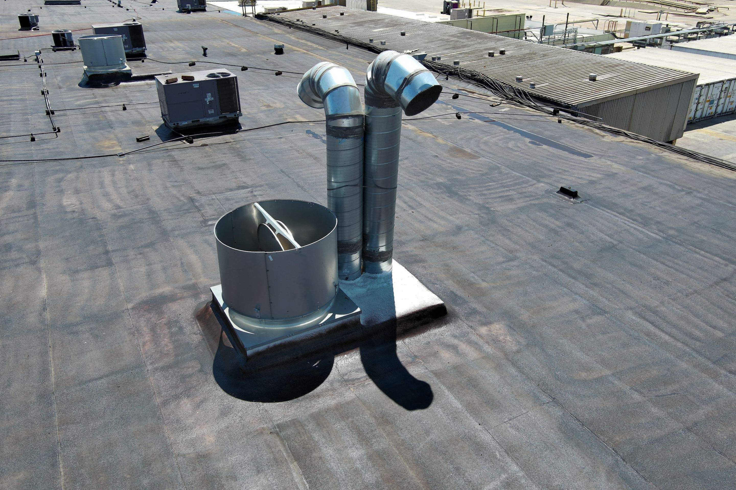 Pro Farms Spray foam roofing project by Straight Edge Roofing Inc