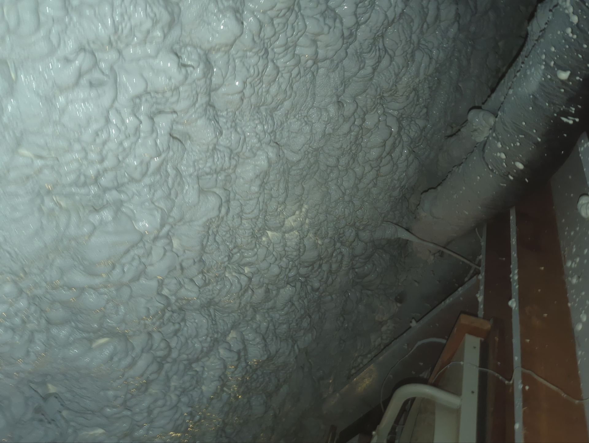 Attic Retrofit using open cell spray foam by NYS Foam & Energy