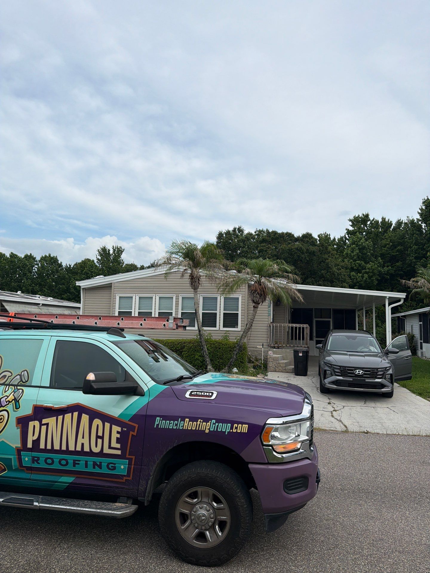 Orlando Residential Standing Seam Metal Roof Installation in Light Stone by Pinnacle Roofing Group