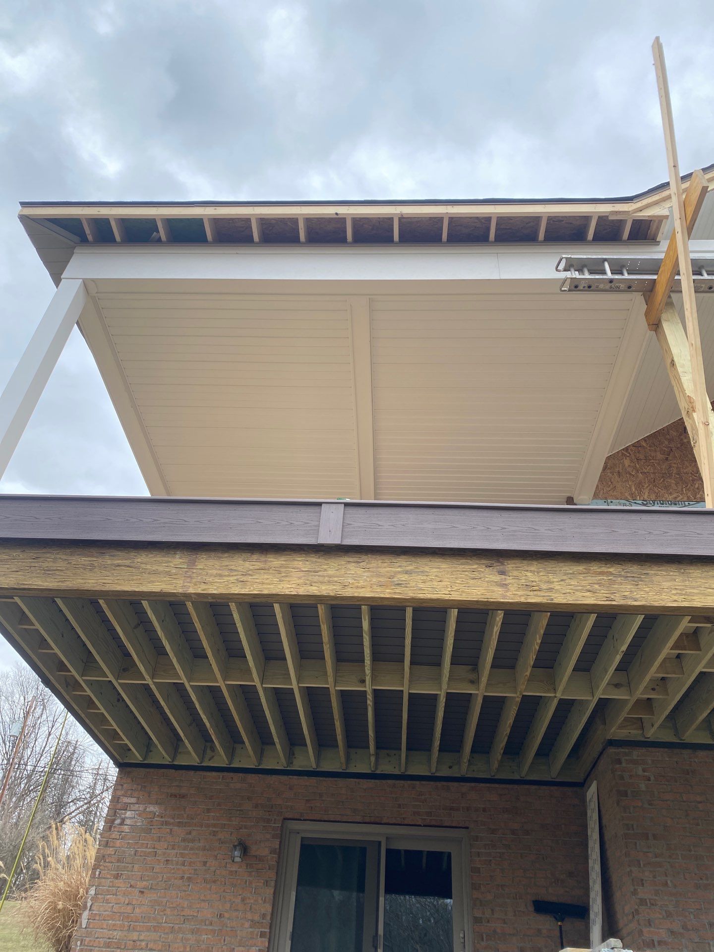 Deck and Roof Build by Cousins Roofing Siding & Decks