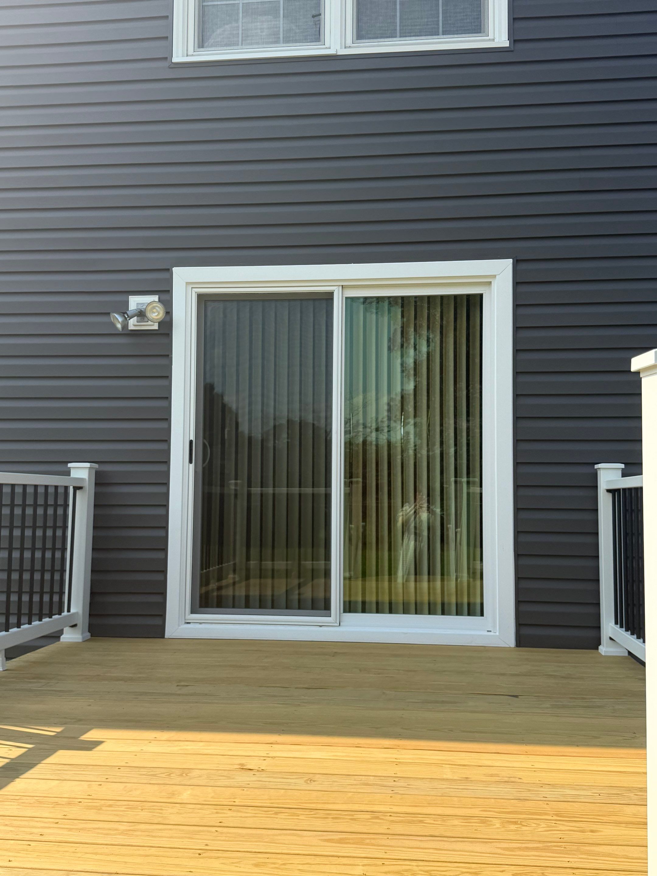 Dark Gray Siding and Custom Deck Installation in Kinston by The Remodeling Company