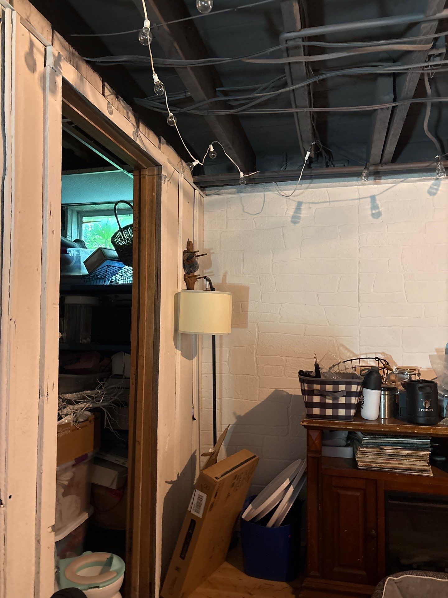 Wanamingo Basement Renovation with Exposed Ceilings and Wood Paneling by CompanyCam Sales Demo