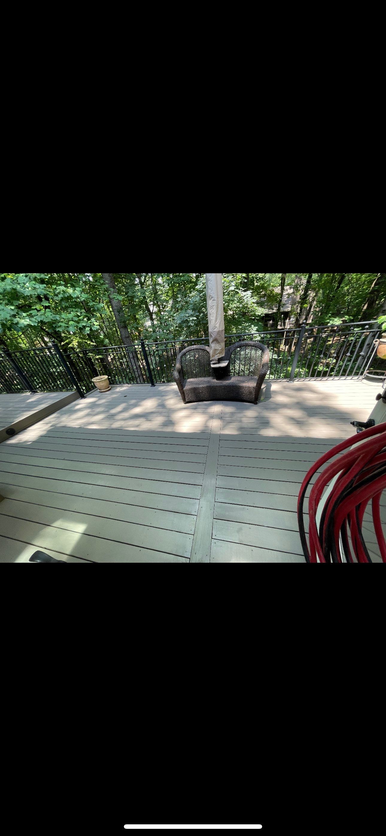 Custom Tiered Composite Deck and Covered Porch in Alpharetta by Swift Home Renovations