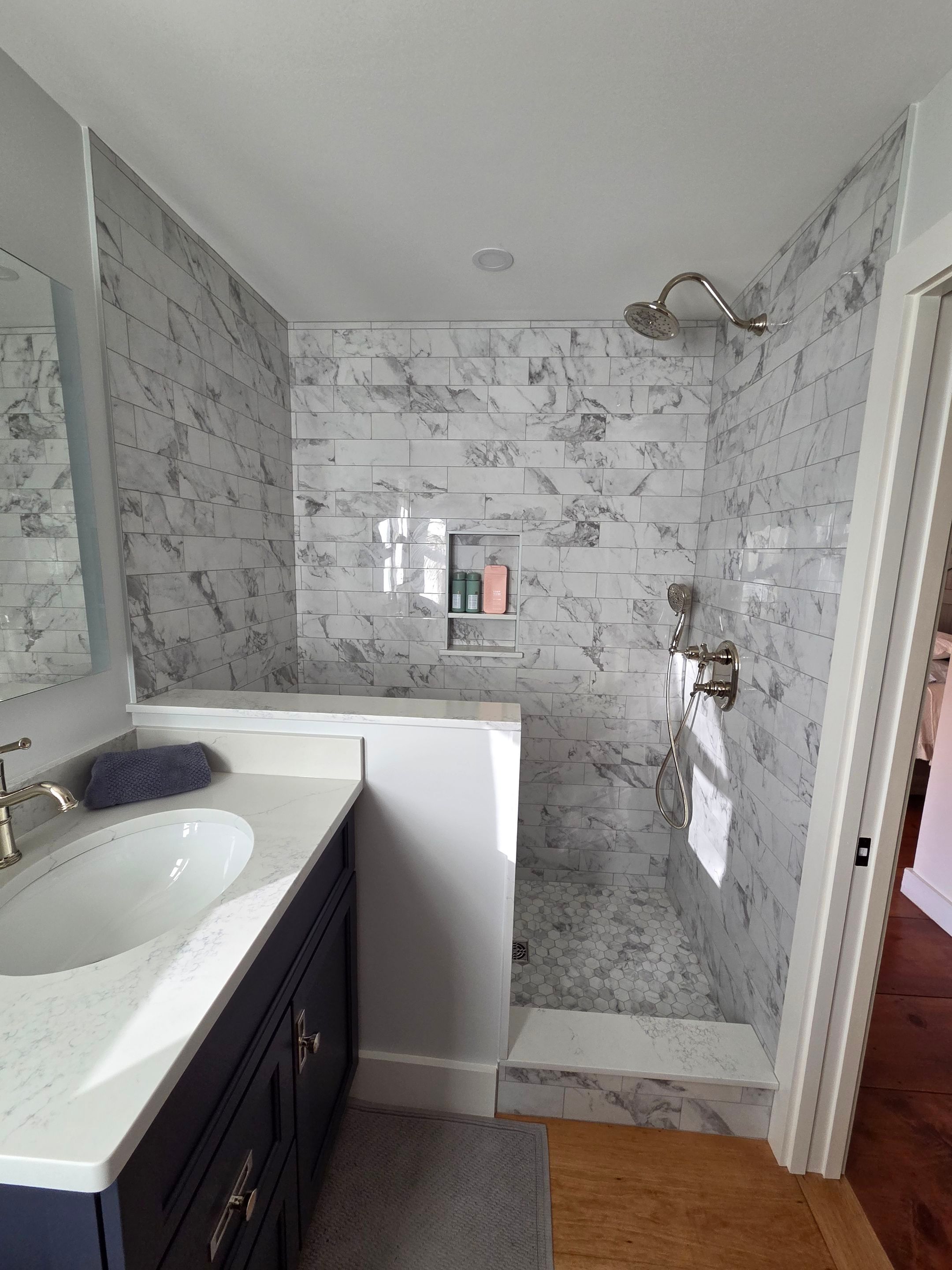 Frameless Shower Enclosure with Header Bar  by Cheshire Glass Company