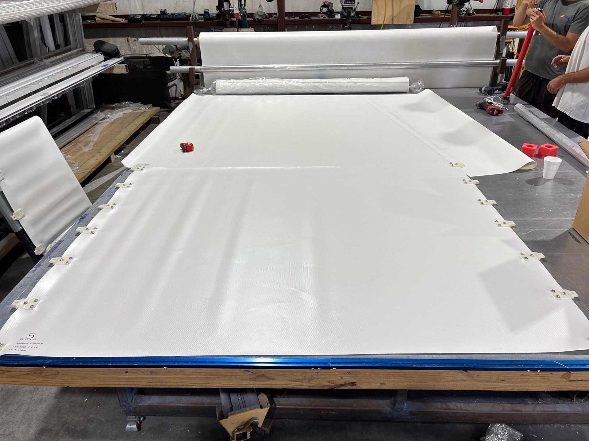 Custom Hurricane Fabric Storm Shutter Installation in Panama City by Brannan Aluminum Inc.