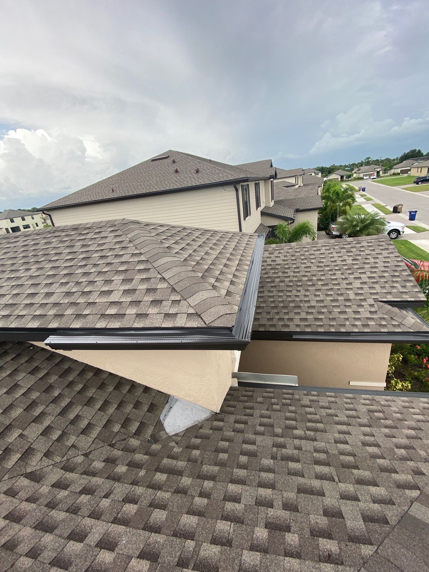 Brown Seamless Gutters for Homes in Fort Myers by Gutter Professors