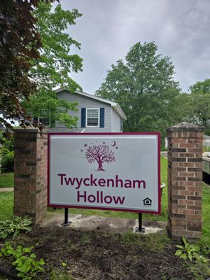 Monument Sign Installation Between Decorative Brick Pillars in South Bend