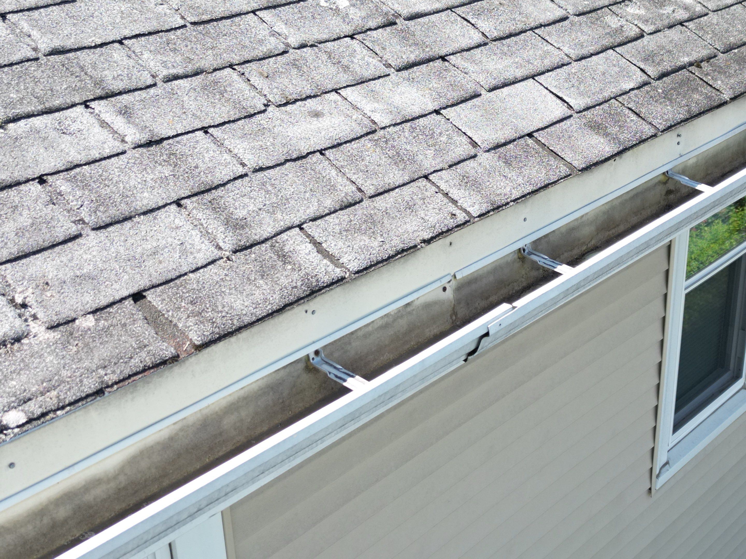Roof Replacement with Skylight Flashing in Waltham, MA by Mighty Dog Roofing of Greater Middlesex County