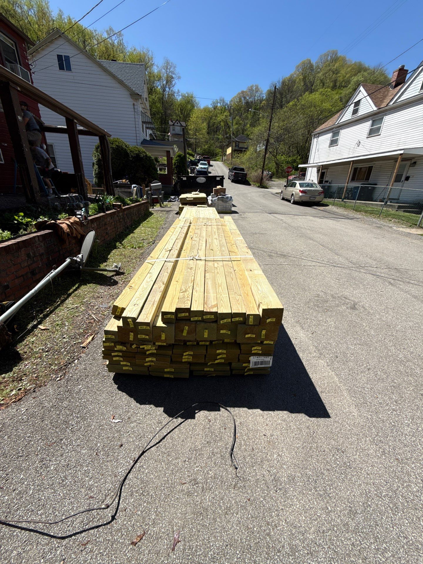 Roof sunspace deck  by Cousins Roofing Siding & Decks