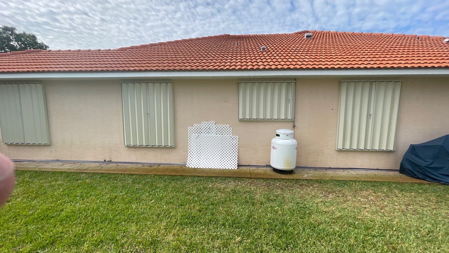 Ivory Accordion Shutters by Smart Guard Shutters