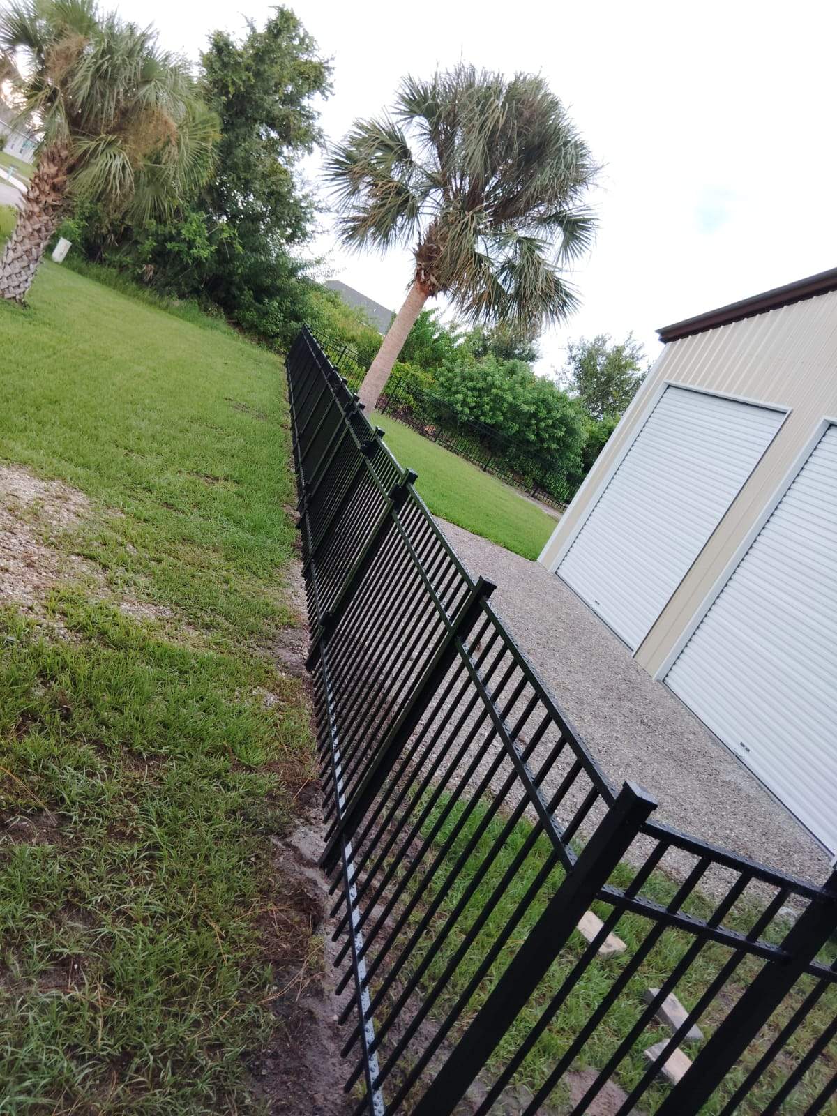 Black Aluminum Picket Fence Installation for Port Charlotte Residence by True Fence LLC