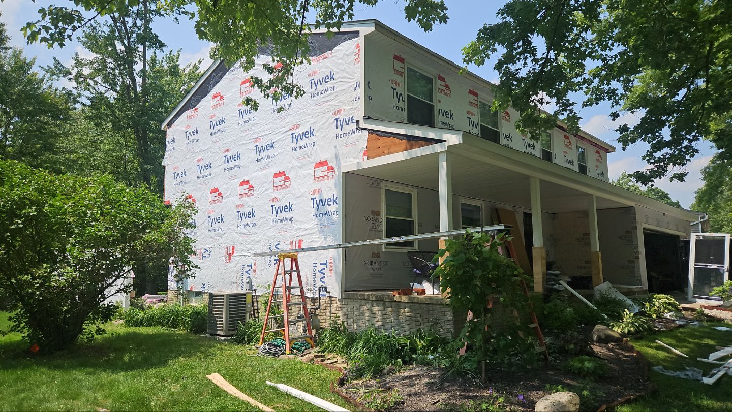 Roof, Siding, & Gutters by Absolute Roofing and Construction