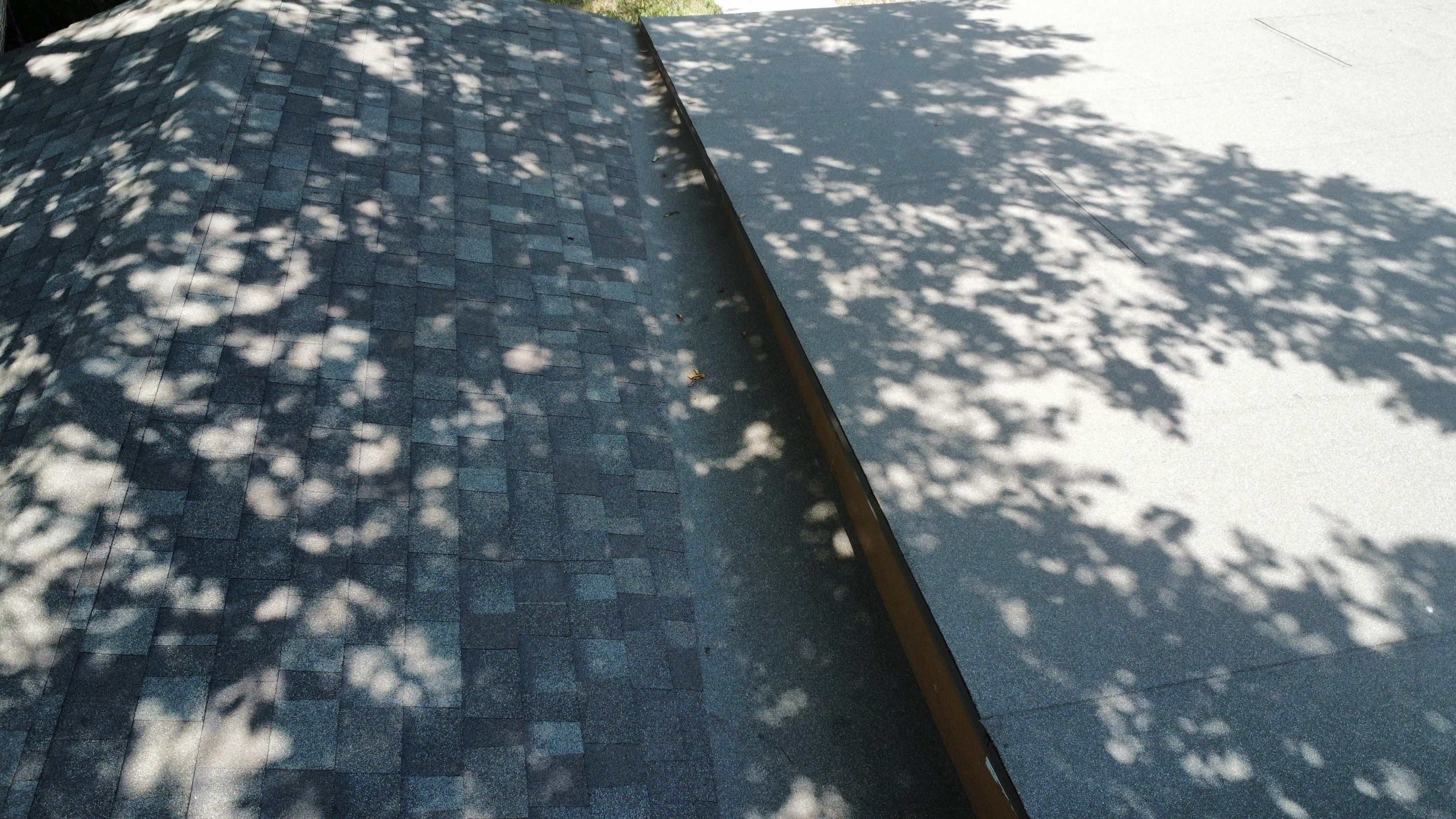 Mixed Roof System ā Oakridge Driftwood + Flat Roof Section | Austin, TX by Kstylez Roofing & Construction