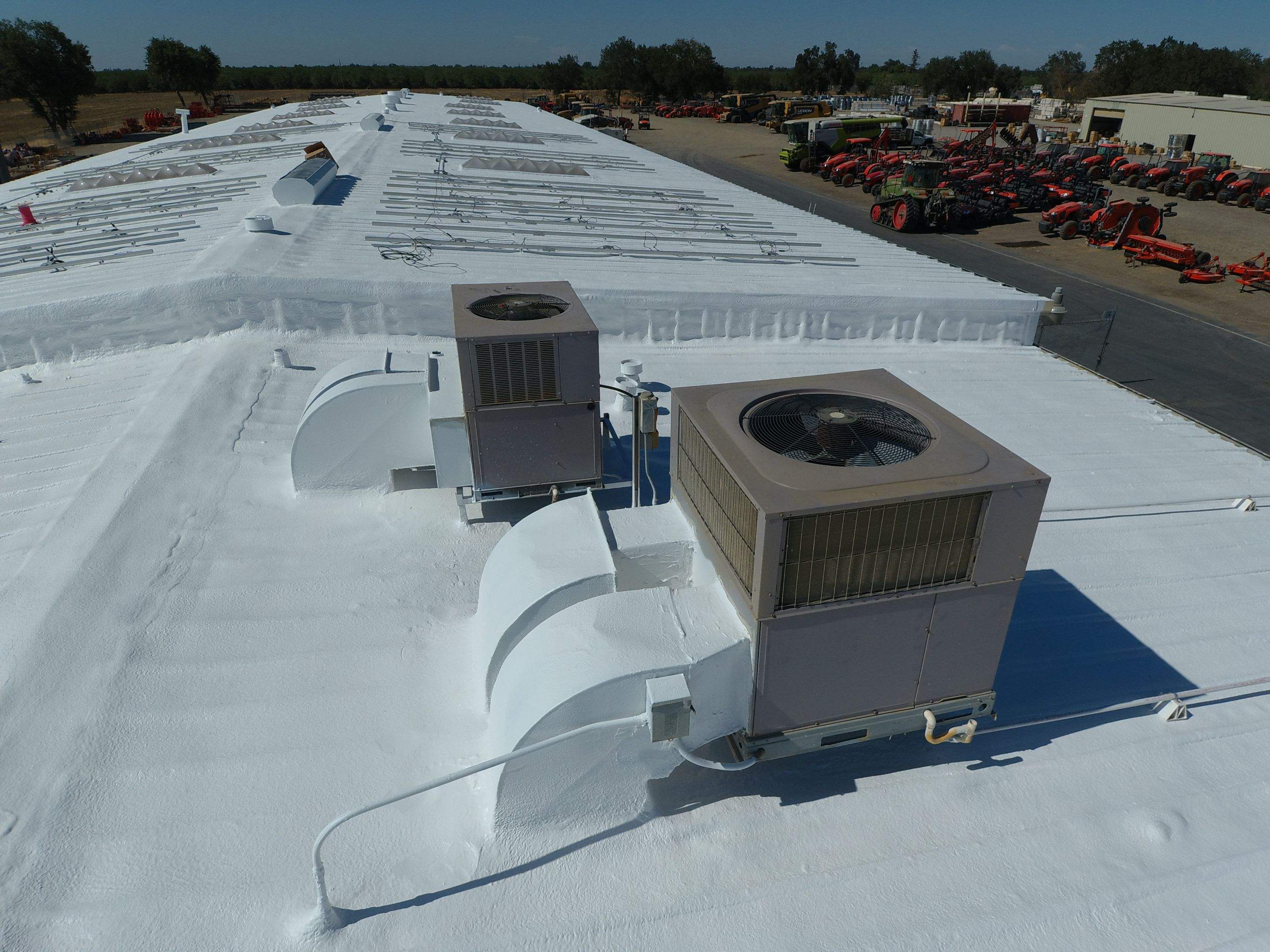 Spray foam and coatings using Conklin Benchmark/PUMA XL coatings and spray foam by Straight Edge Roofing Inc