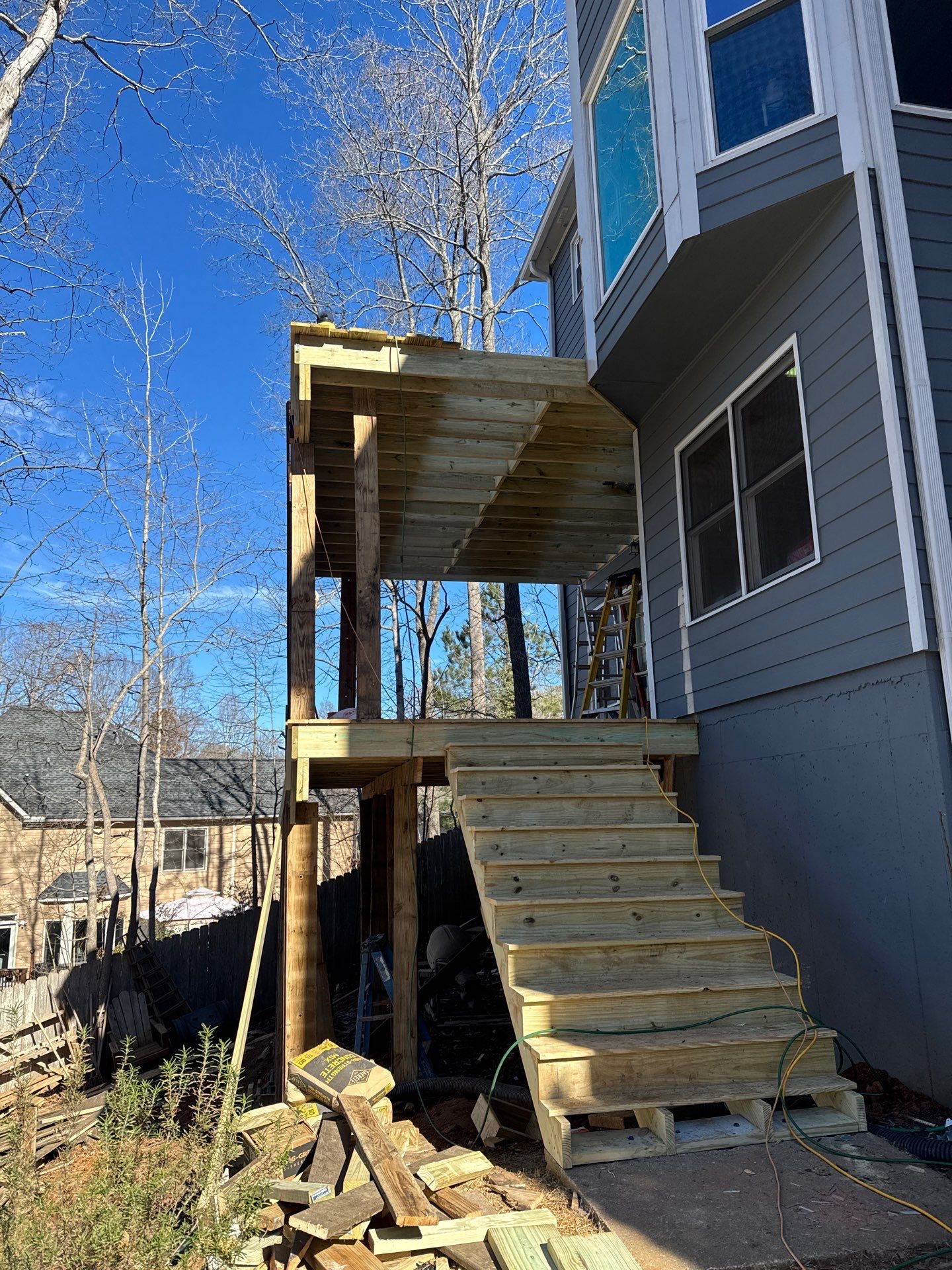 Two-Story Pressure-Treated Wood Deck Installation in Acworth, Georgia by Swift Home Renovations