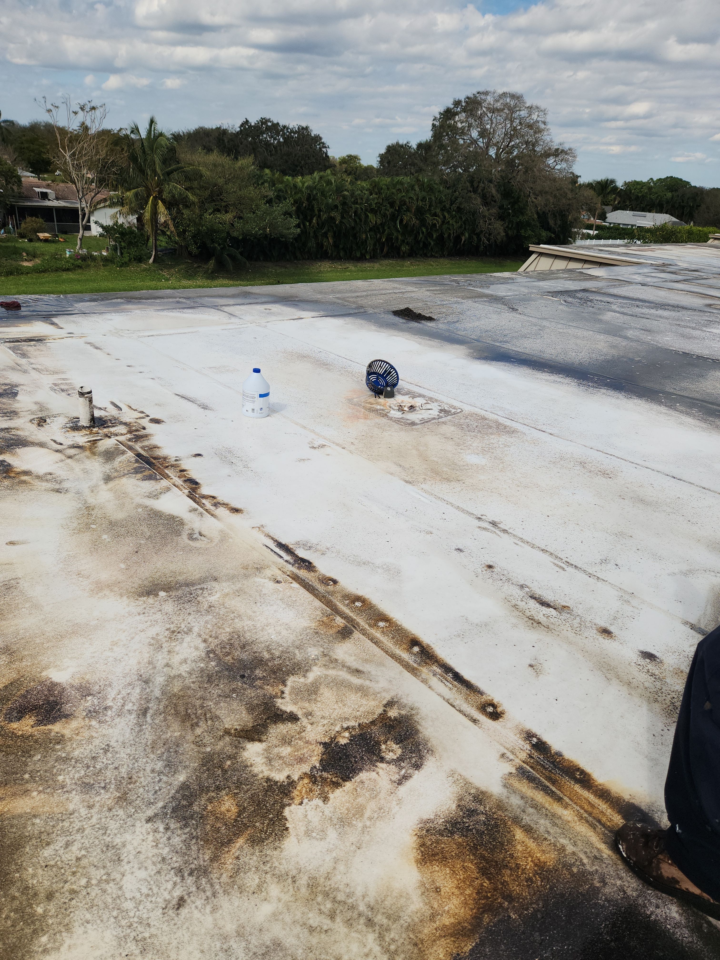 Reflective Silicone Roof Coating and Maintenance in Palm Beach Gardens by Aastro Roofing