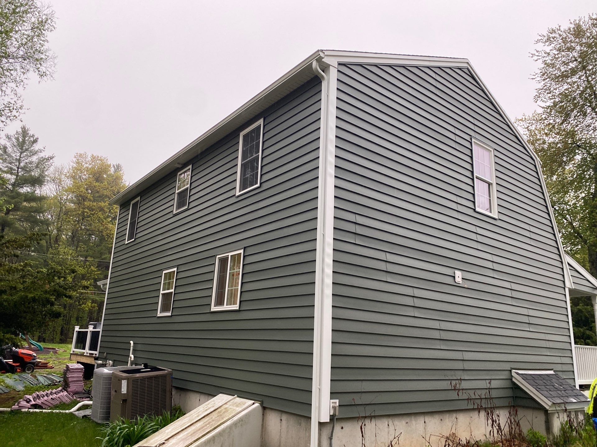 Full Roof Replacement & Farmers Porch Restoration – Asphalt + Standing Seam Metal by Mighty Dog Roofing of Greater Middlesex County