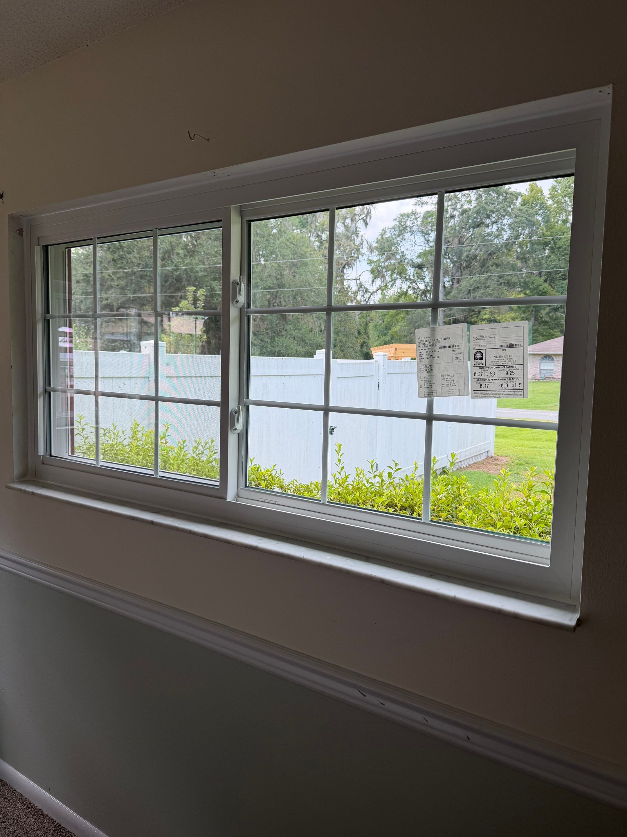 Energy-Efficient White Vinyl Window Replacement in Lake City, Florida by Windows & Doors Store