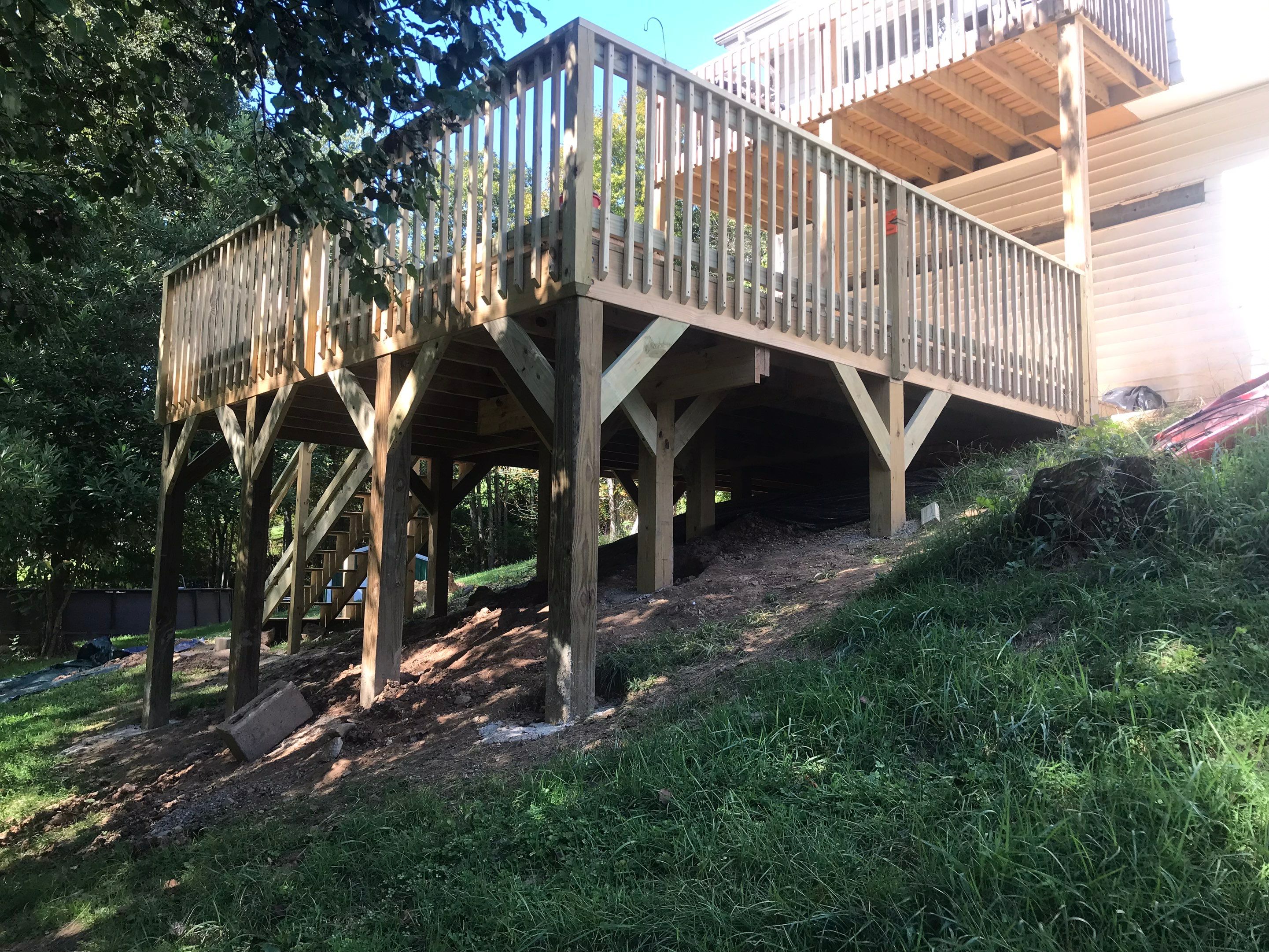 Deck Installation using Pressure Treated Lumber by Secure Construction Company Inc
