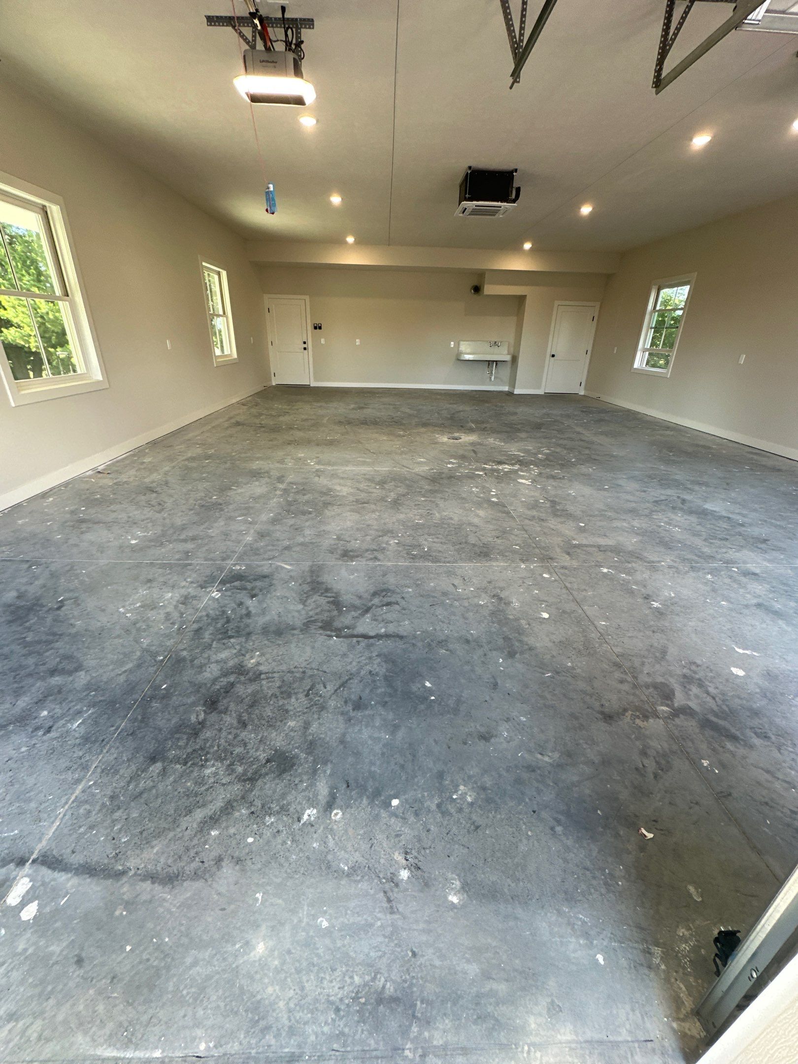 Trail Mix Epoxy Garage / Even Space by Goat Coatings
