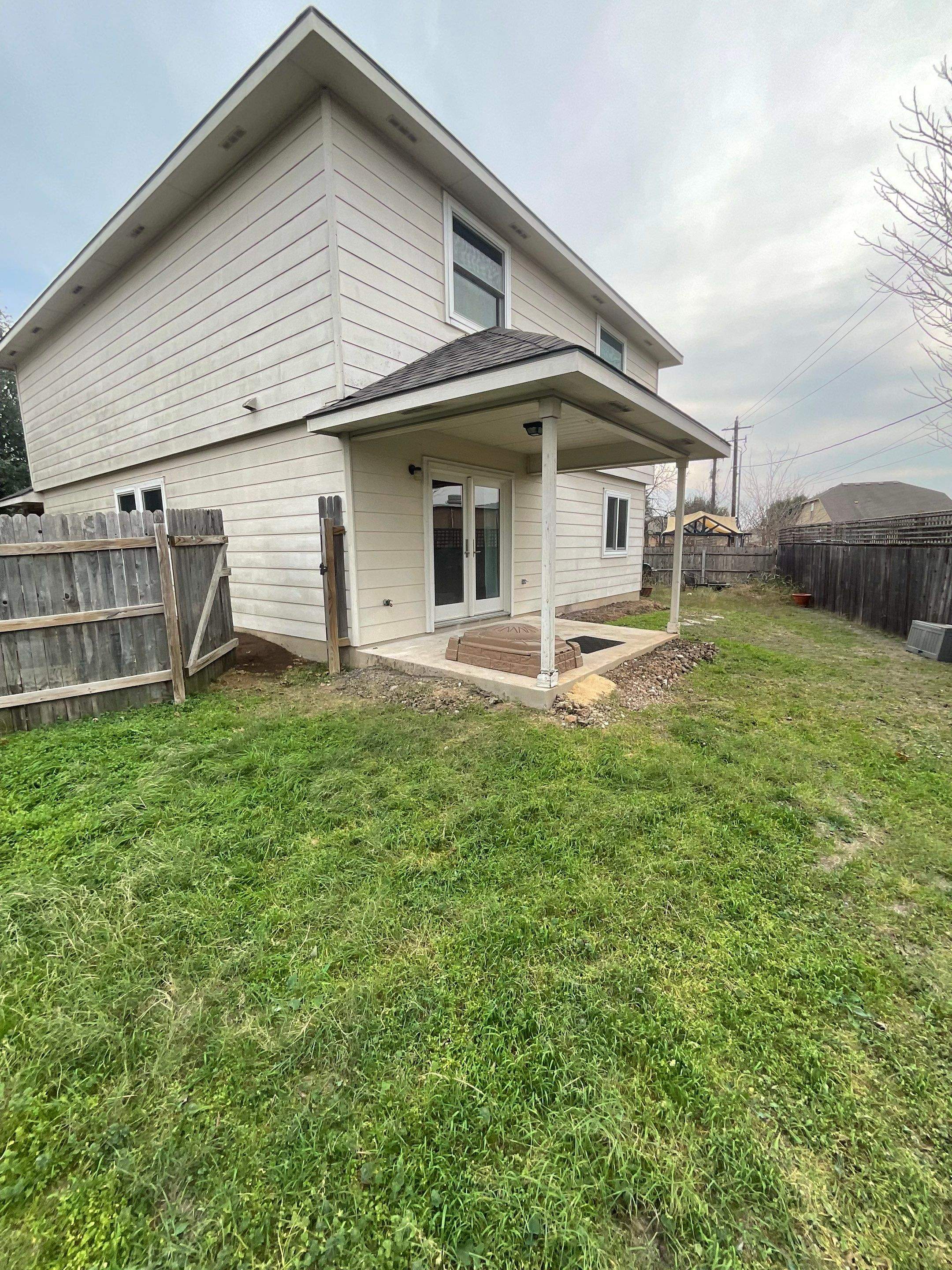 Horizontal Siding Replacement and Concrete Patio Installation in Lincoln by CompanyCam