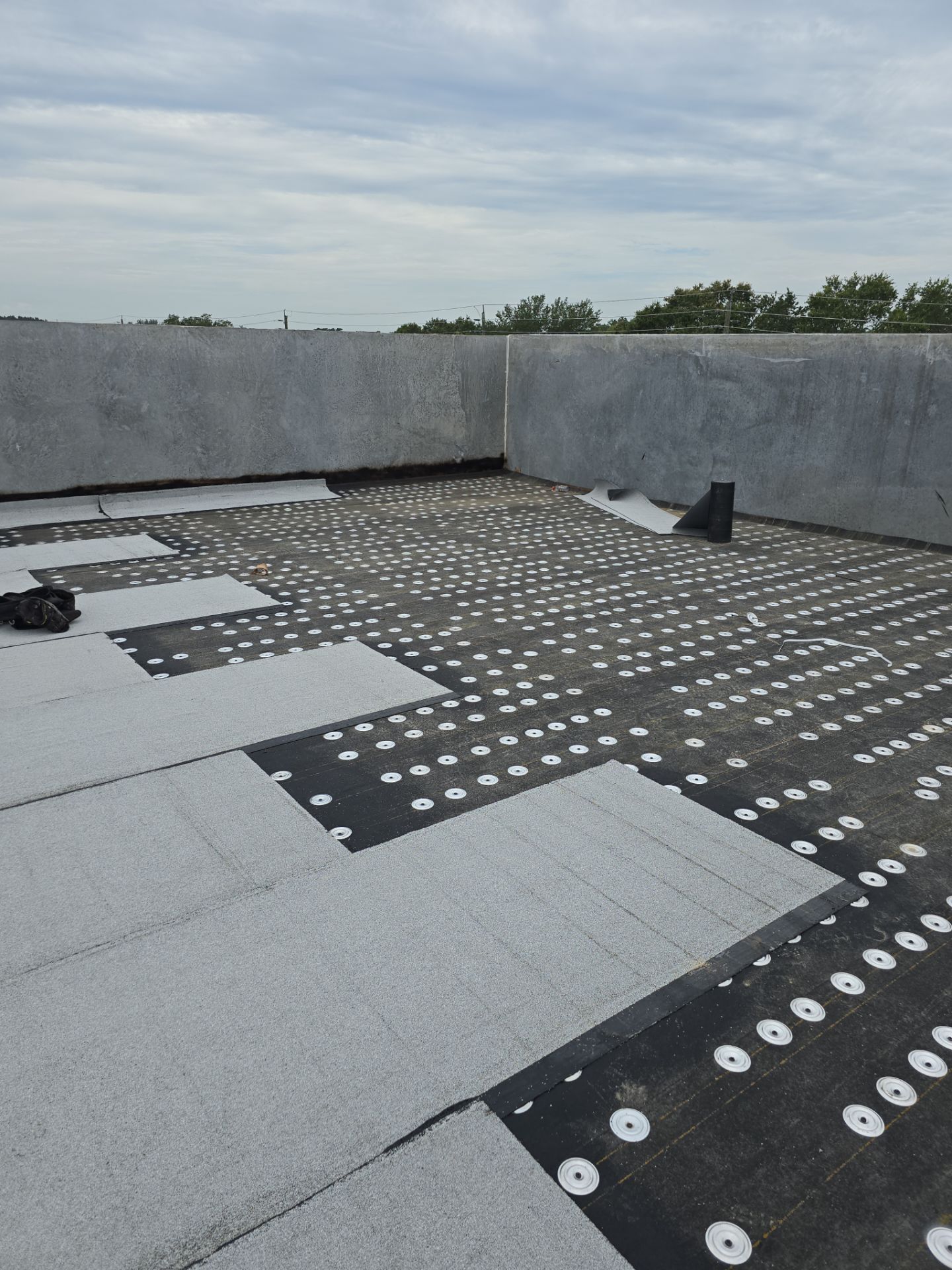 Torch Applied Modified Bitumen Roof Installation by Sailfish Roofing