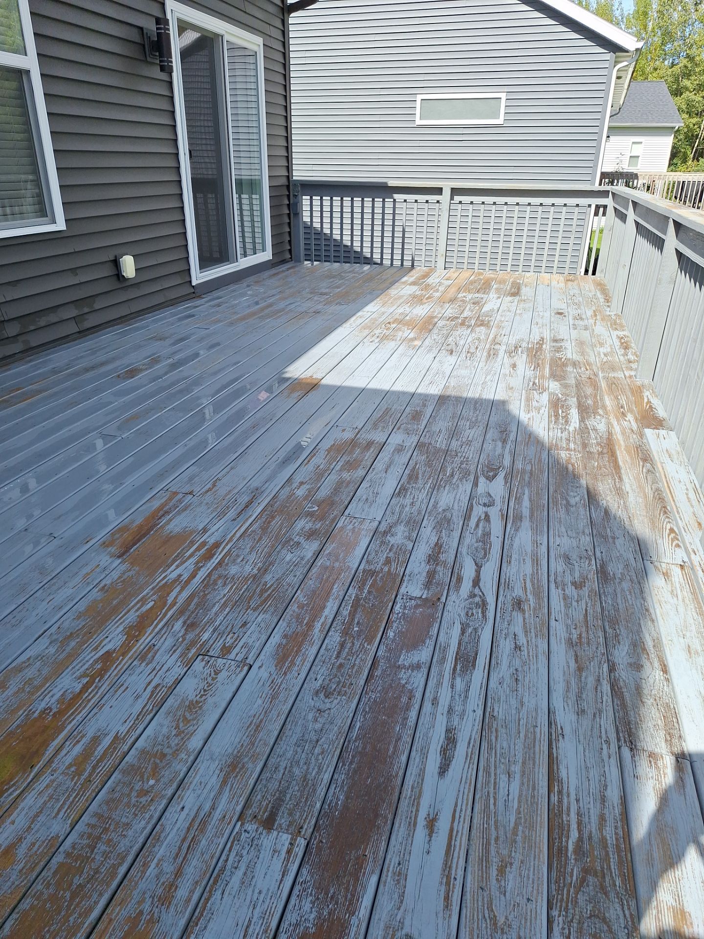 Solid Color Deck Staining for a Residential Home in Spring Lake by Gordon Painting