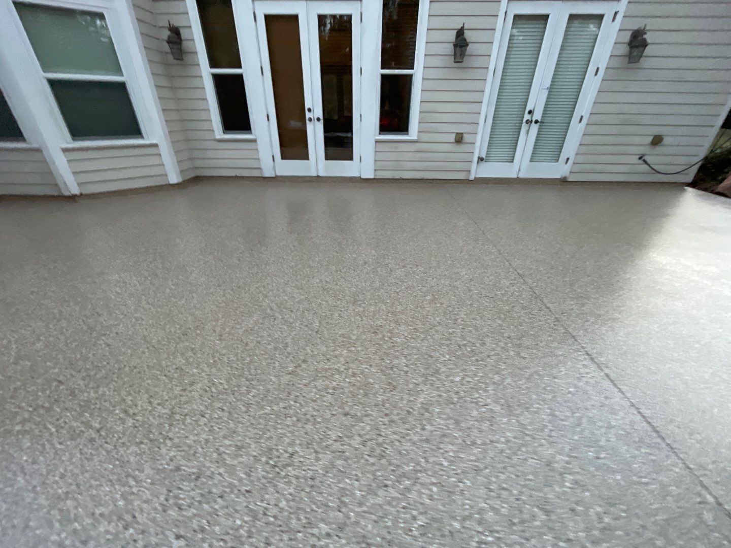 Patio  in Gainesville, FL in Sandstone by Cross Creek Concrete Coatings