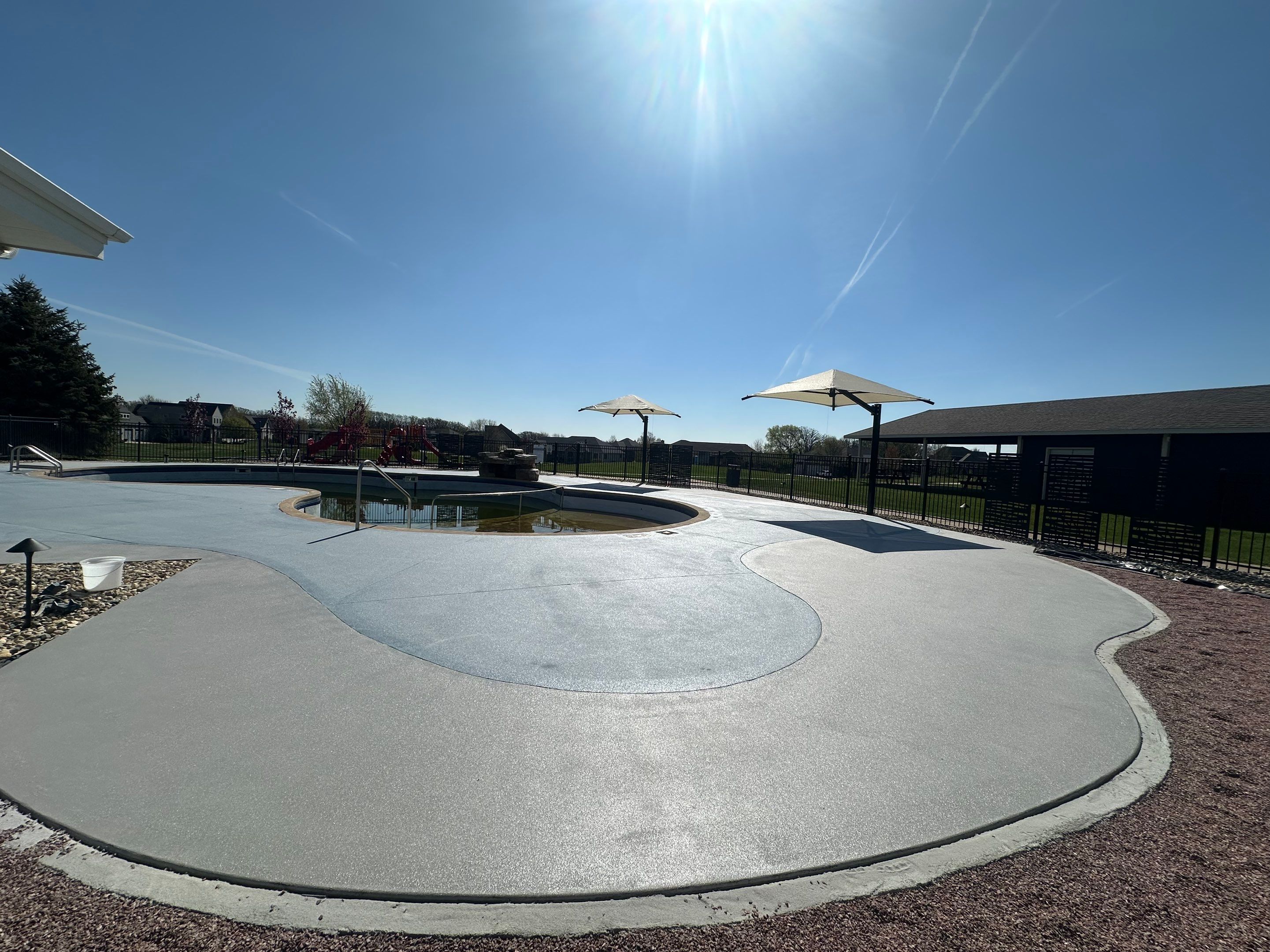 Arbors Edge Pool Deck Restoration and Textured Concrete Coating by Select Painting, Coatings & Garage Cabinets