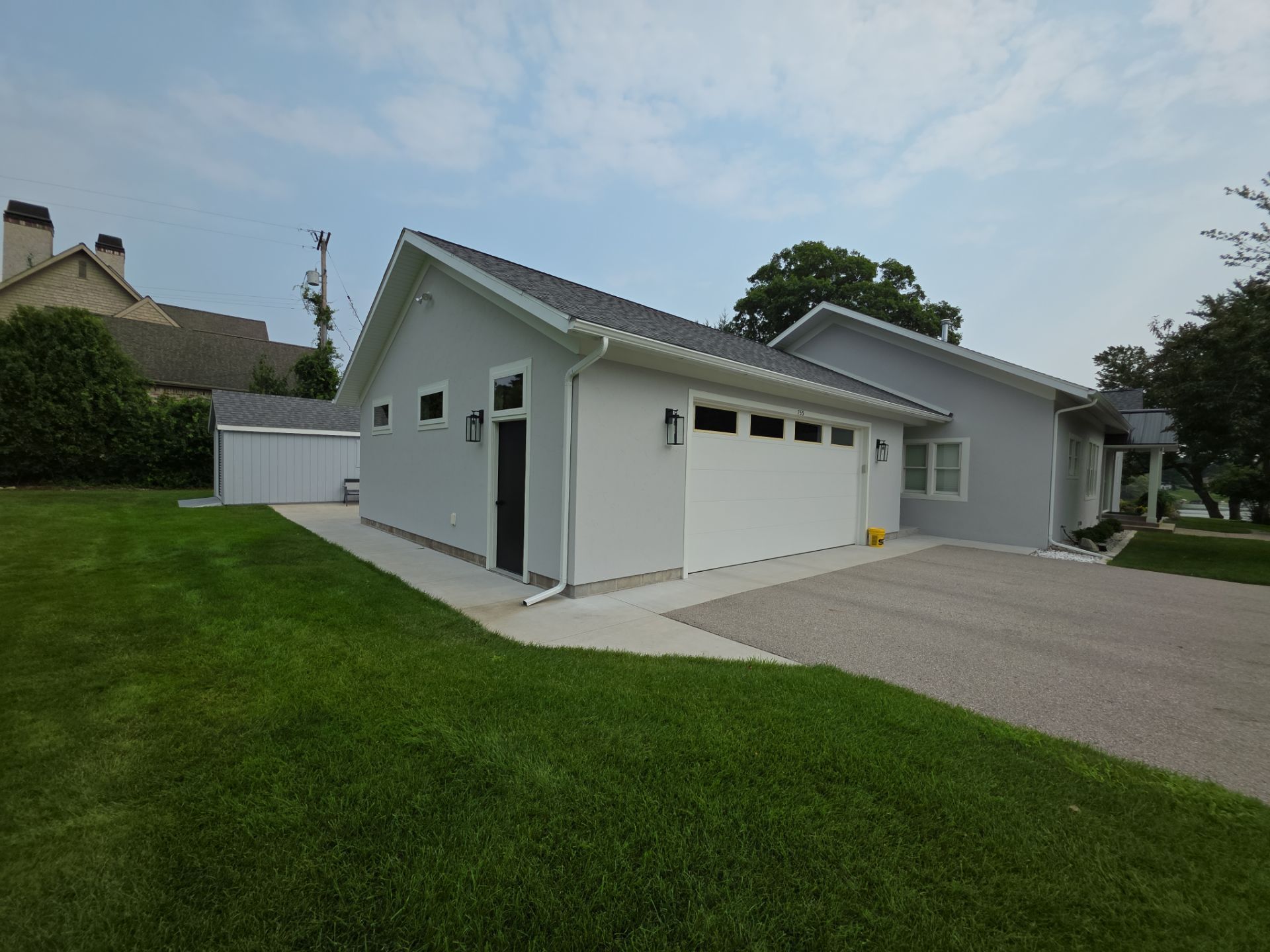 Norton Shores Residential Stucco Repair and Exterior Painting Refresh by Gordon Painting