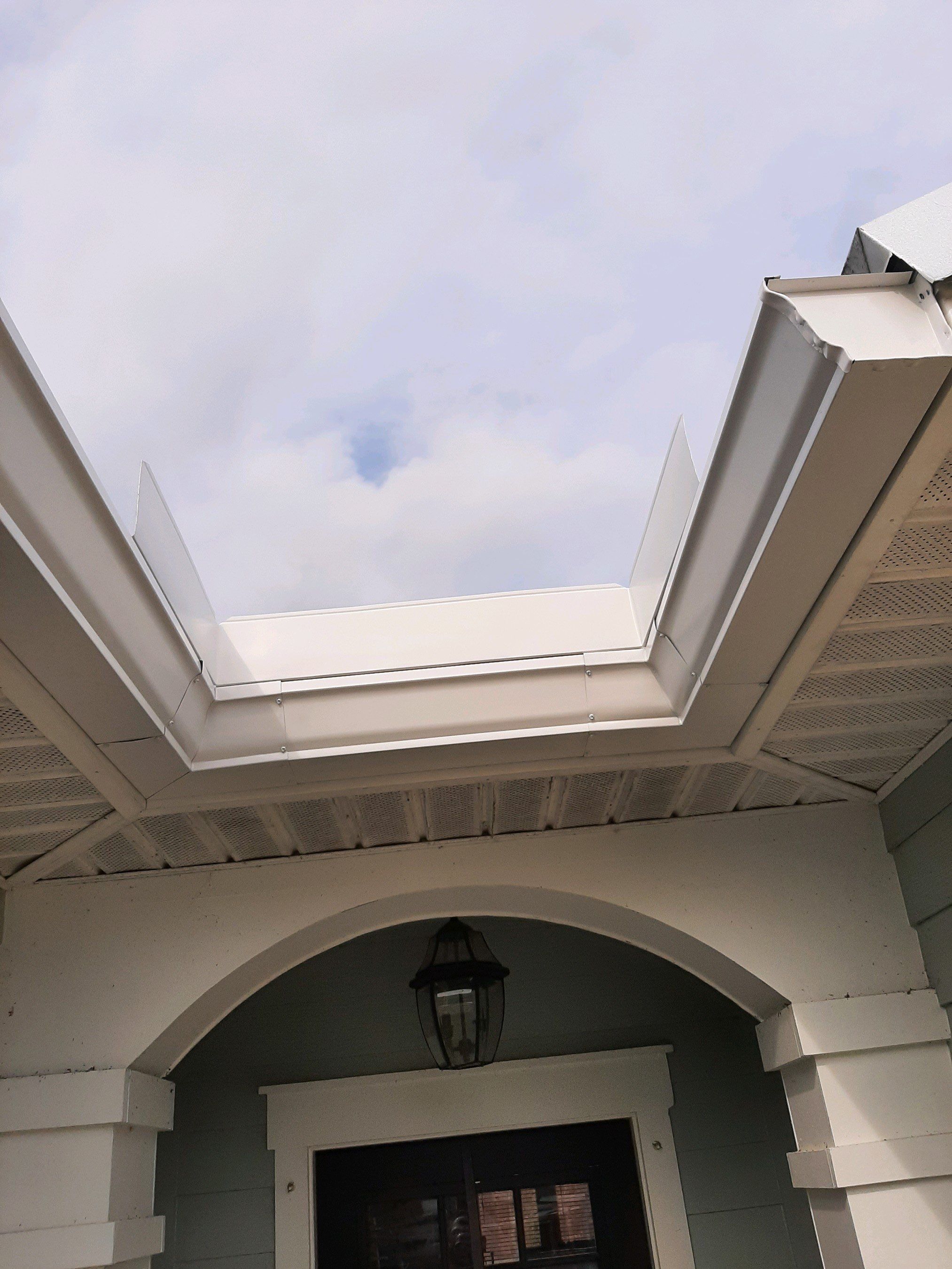 Seamless Gutter Installation using White K-Style Gutters by Gutter Professors