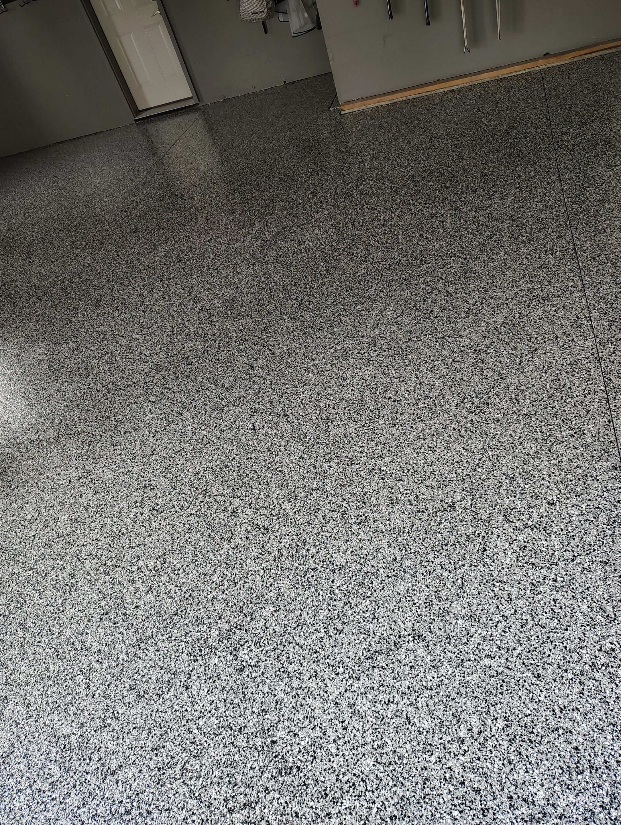Garage Floor Concrete Coating and Crack Repair in Sioux Falls by Select Painting, Coatings & Garage Cabinets