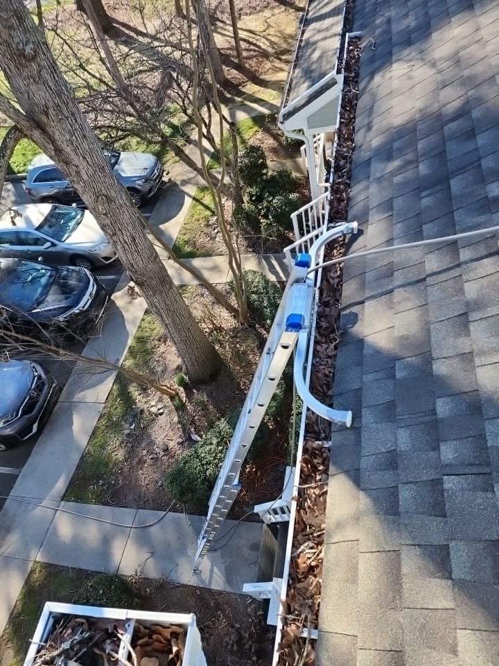 Gutter Cleaning using water by G&H Home Tech Pros LLC