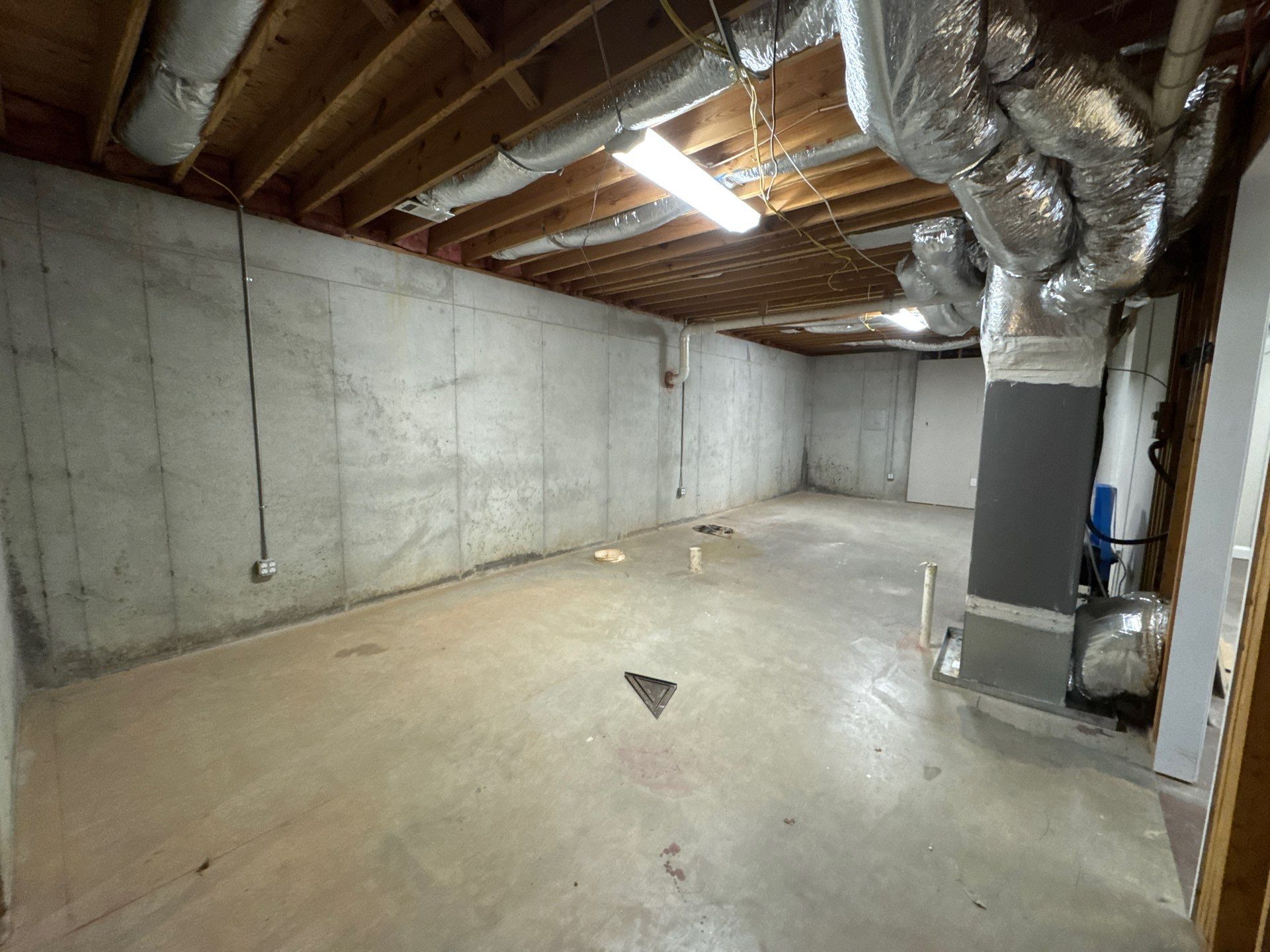 Full Basement Remodel in Powder Springs Featuring Custom Kitchenette by Swift Home Renovations