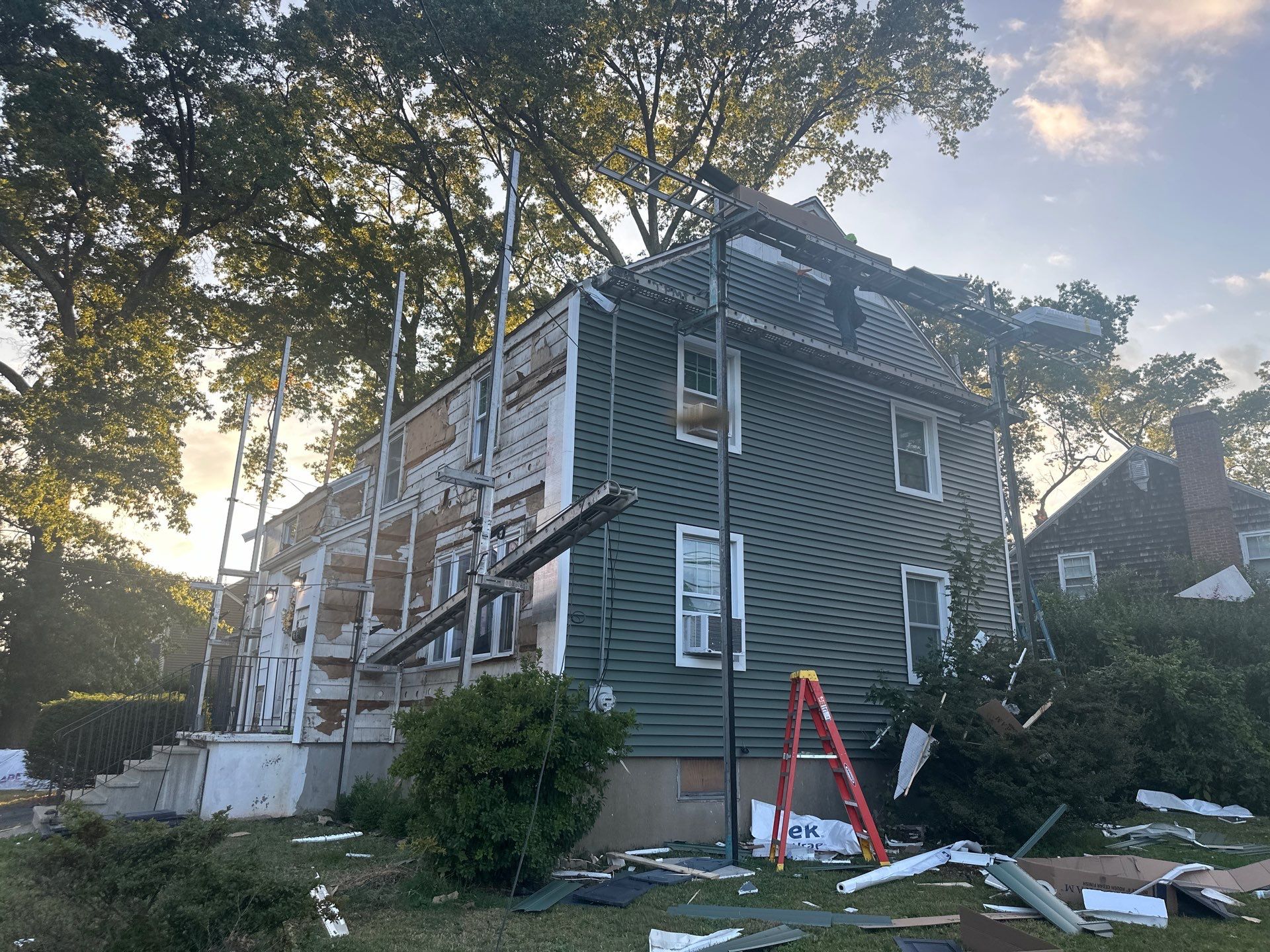 Siding Installation using CertainTeed Monogram Vinyl Siding - D4 - Forest by A Plus Exterior