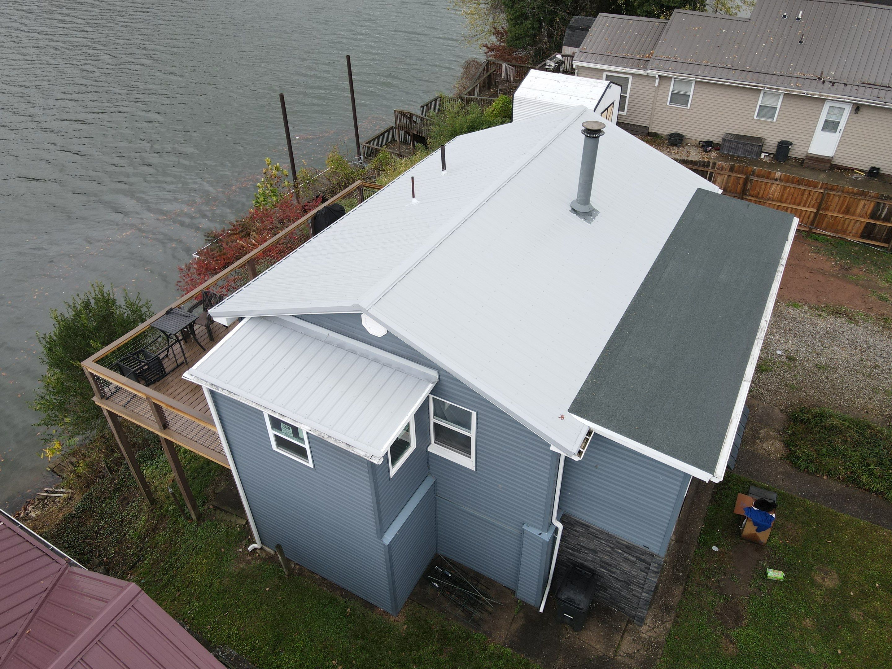 Residential Roofing Installation using Metal by Rainstoppers Roofing