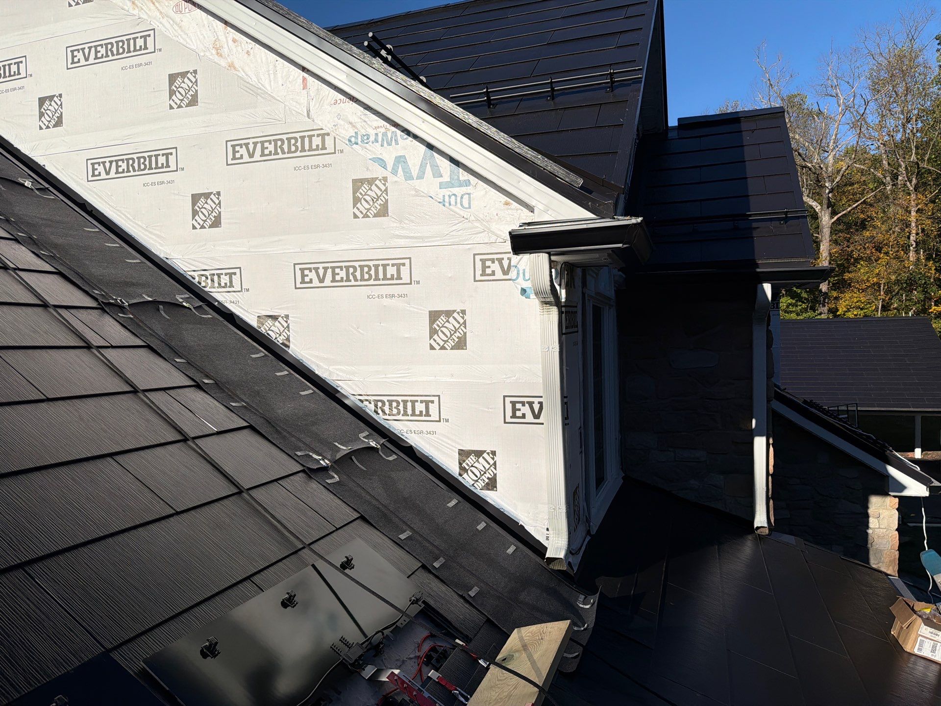 Beautiful James Hardie Siding & Tesla Solar Roof by American Home Contractors