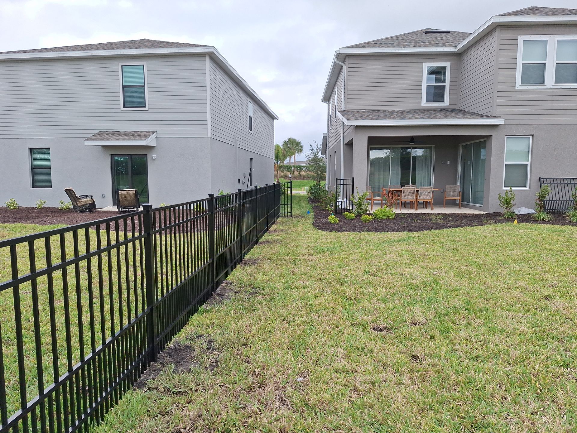 Aluminum Fence Installation using 4ft 3 Rail Black Aluminum Fence by Asap fence and gates, LLC