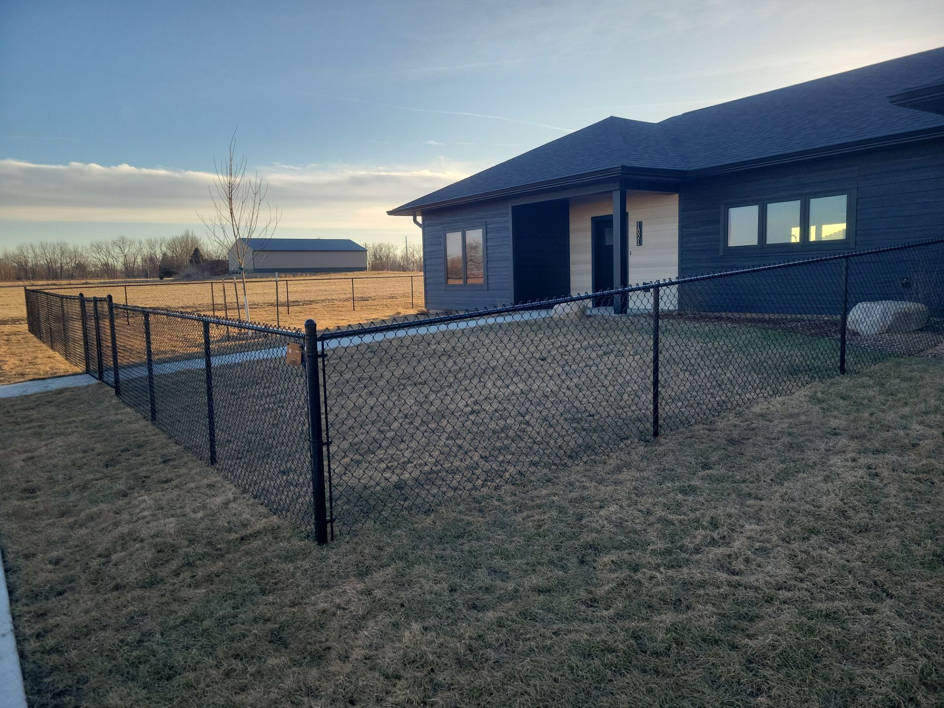Residential Fencing Installation for New Construction Homes in Cedar Falls by Perfect Picket Fence and Stain