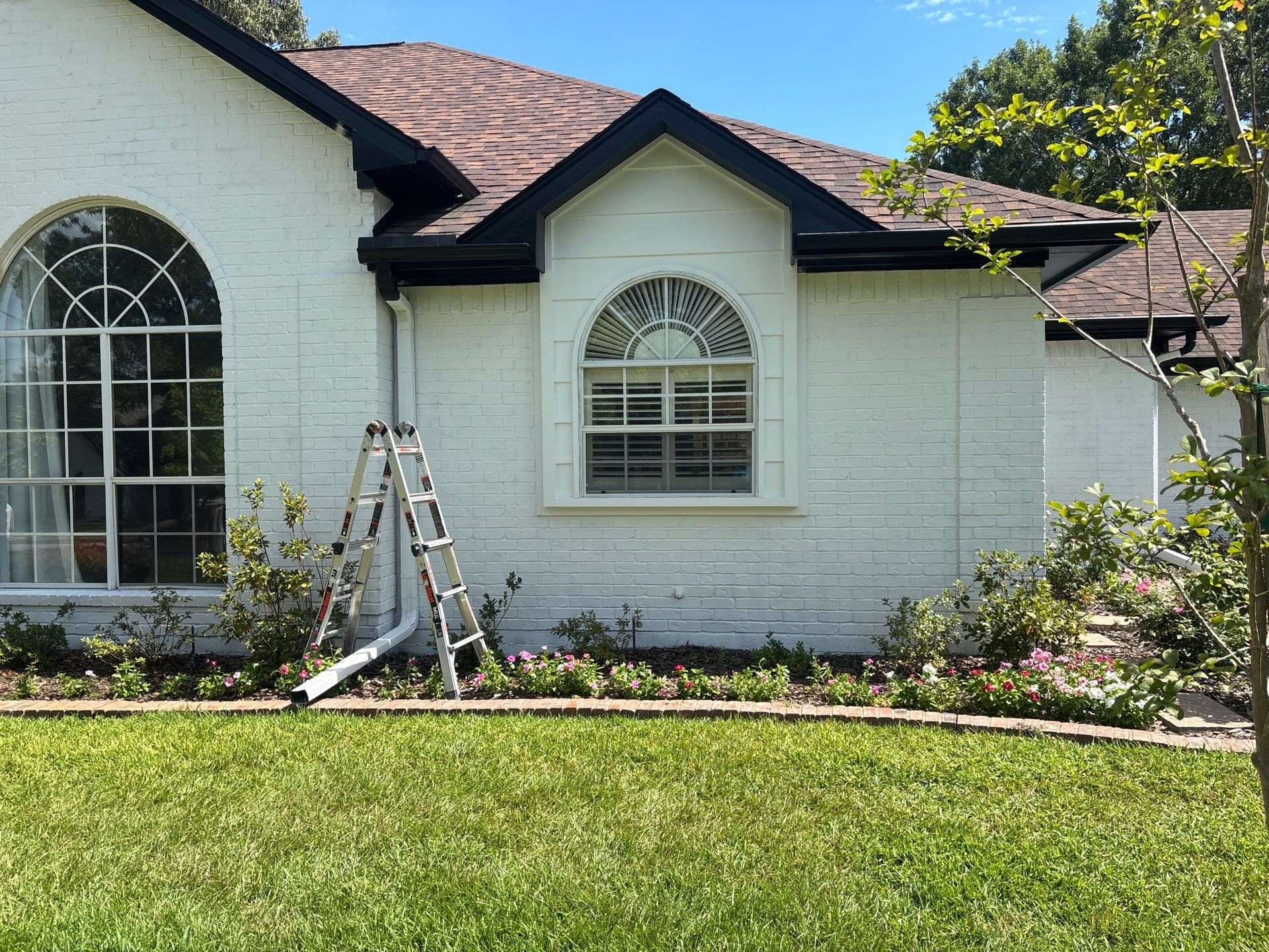Project in TylerExterior Painting in Tyler, TX | White Brick Home, Varnished Fence & Shed Painting by Quality Coats Painting