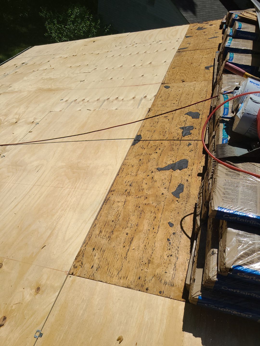 Burke: CertainTeed Landmark Designer Shingles in Moire Black by RM Banning, Inc.