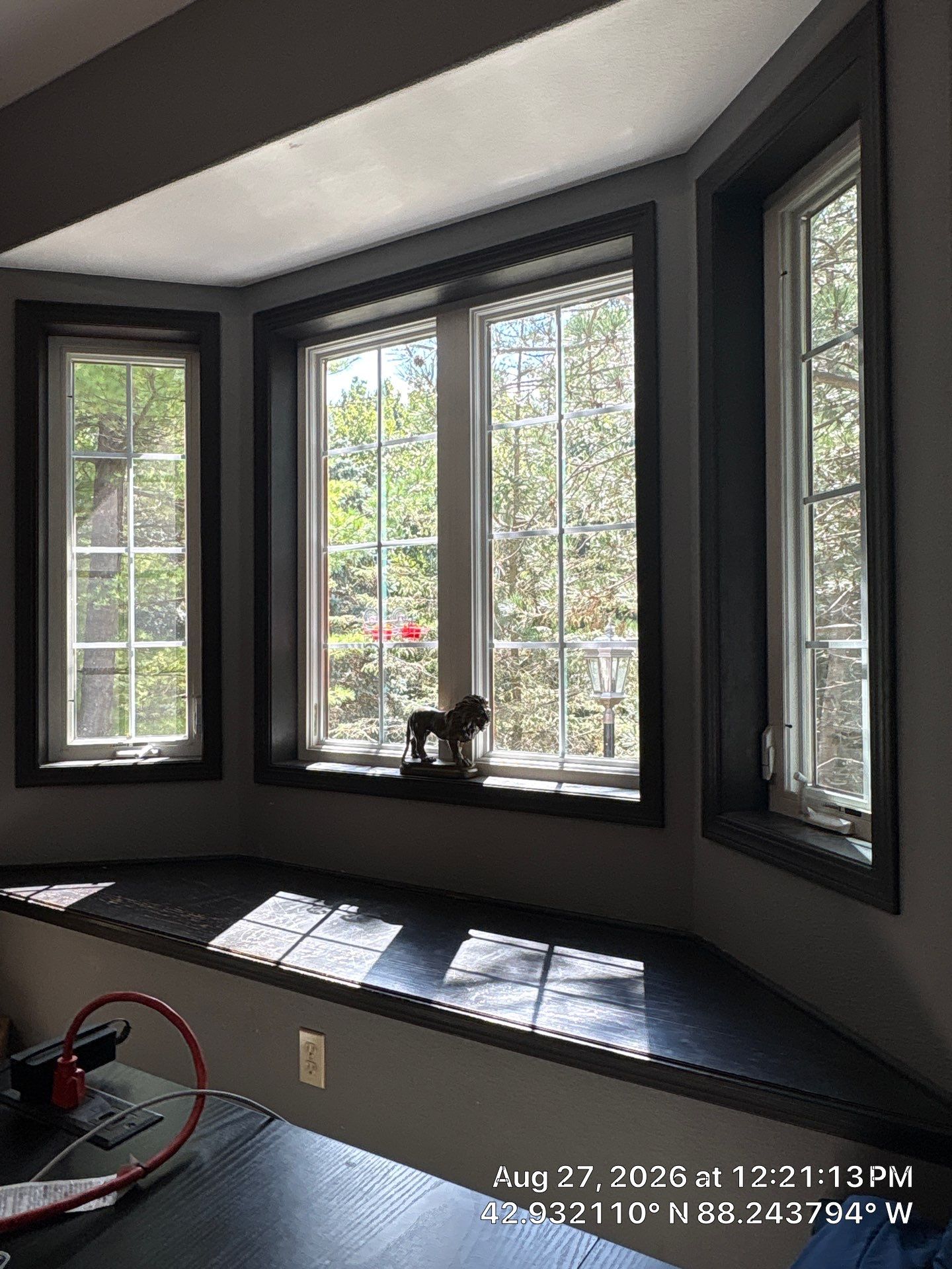 Dark-Stained Wood Sliding Barn Door Installation in Waukesha by CompanyCam Sales Demo