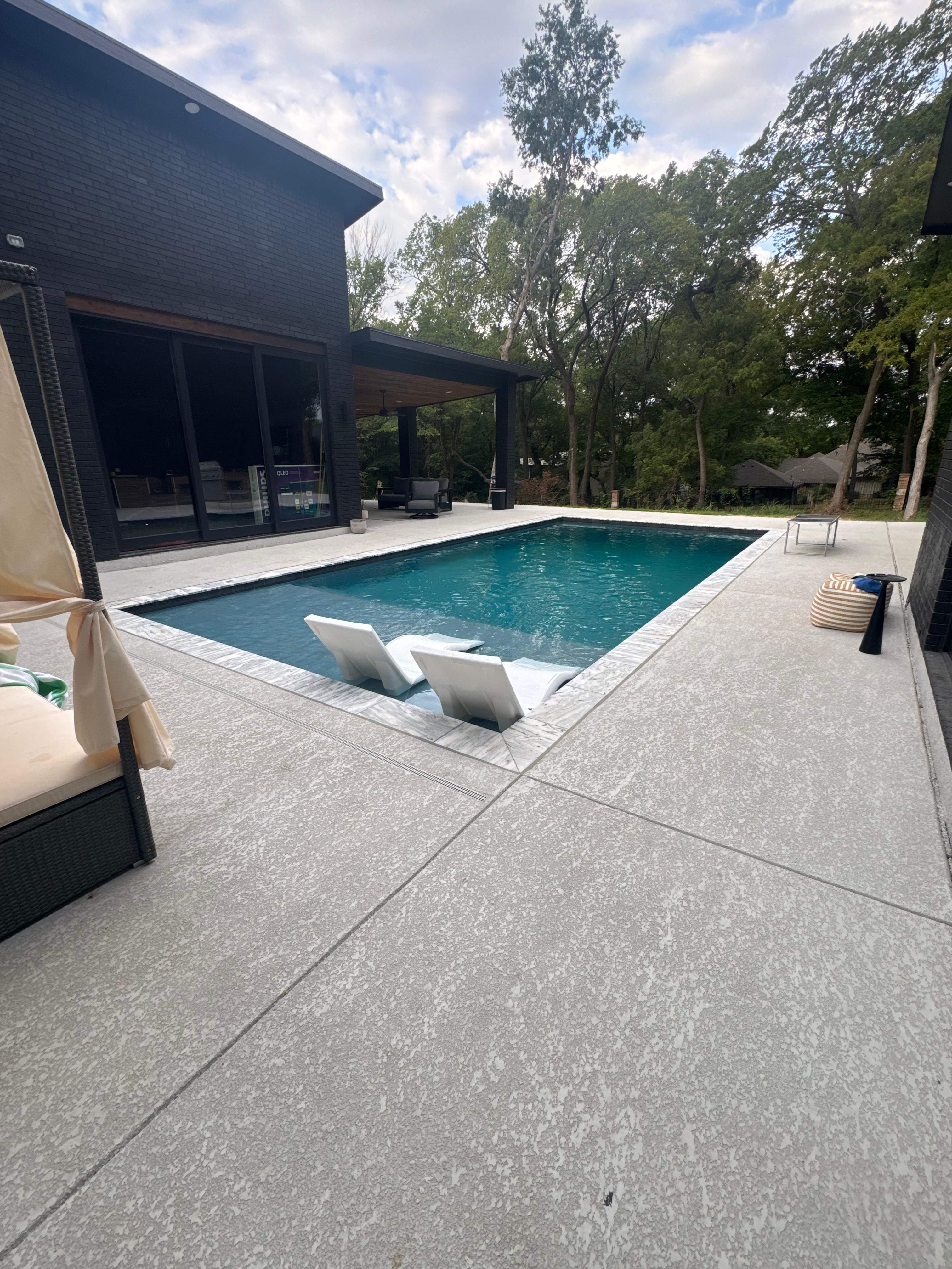 Modern Geometric Pool with Tanning Ledge by Pinnacle Pools and Spas - DFW
