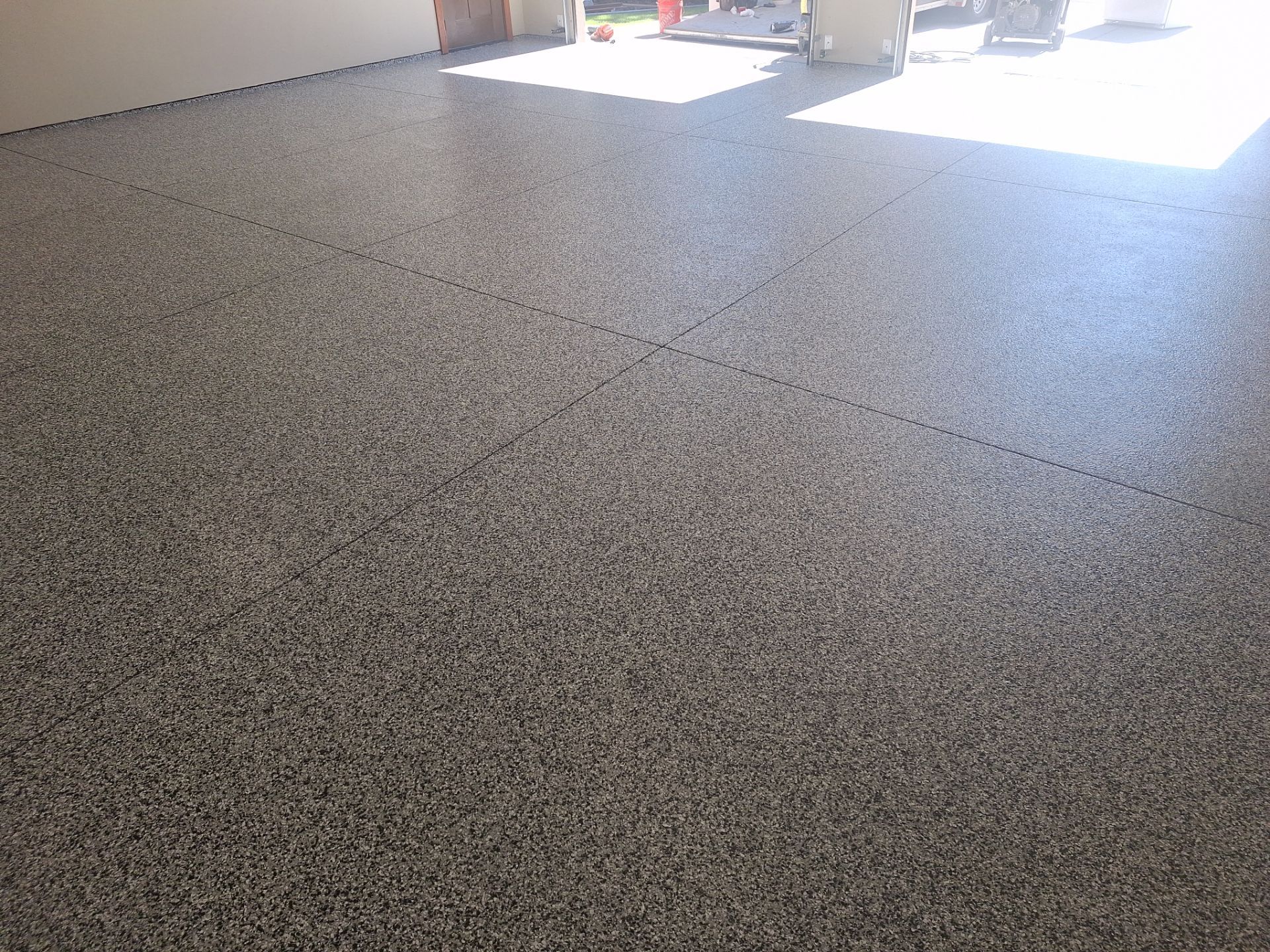 Garage Transformation using Domino by Croc Coatings, LLC