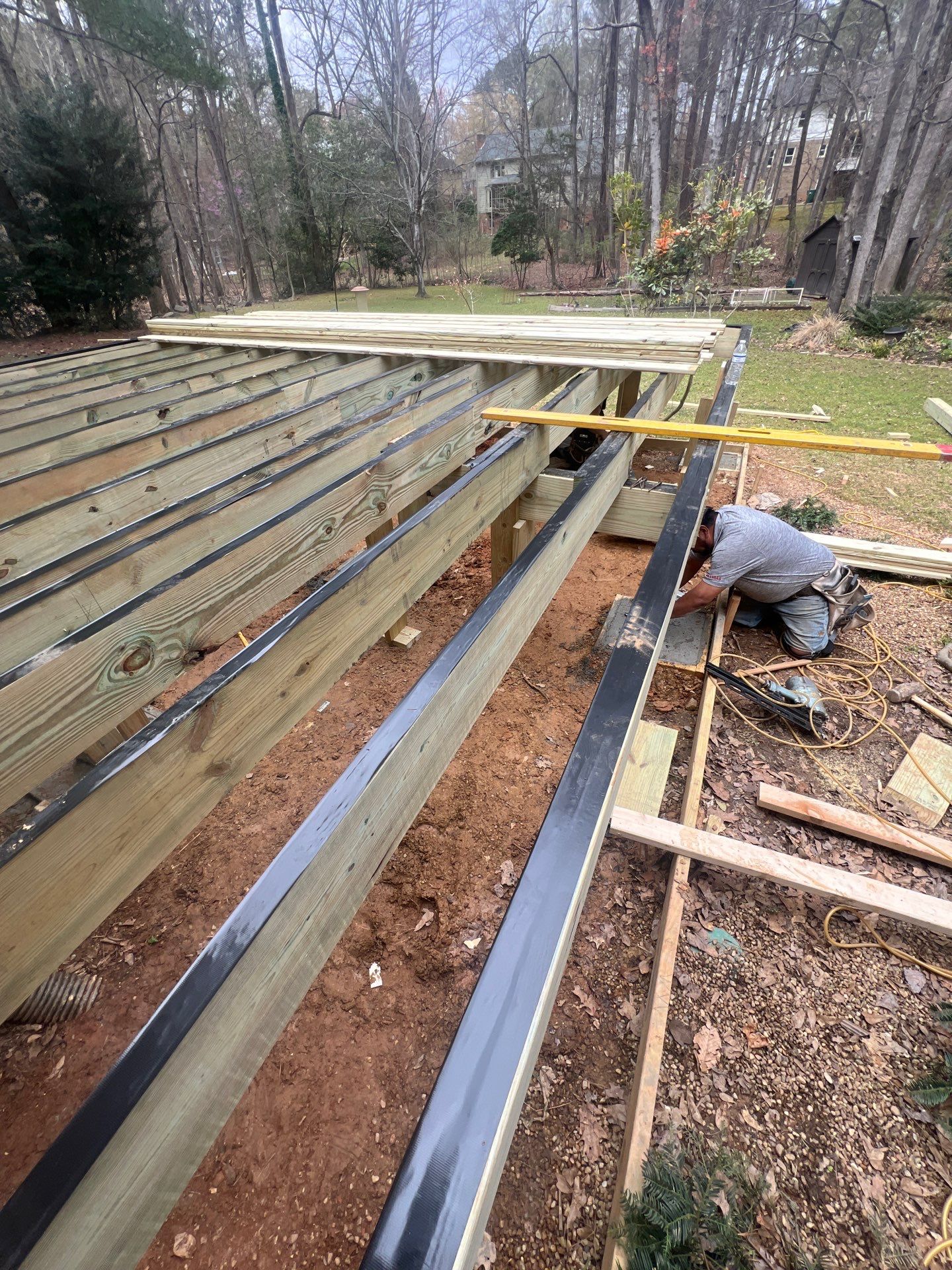Deck Installation using Pressure Treated Pine in Peachtree Corners, GA by Nelson Exteriors 