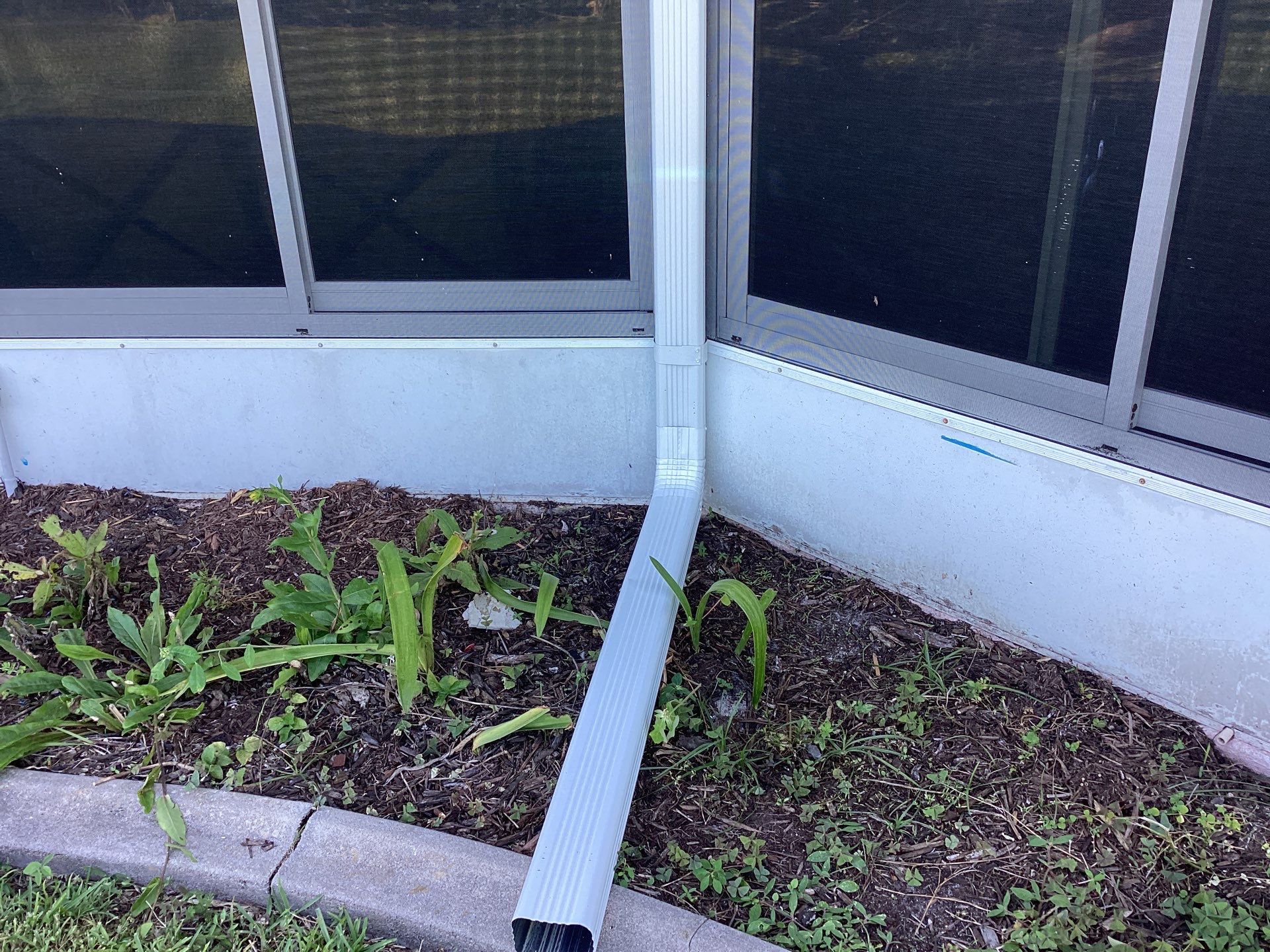 Soffit and Fascia Installation using White Vinyl Soffit in Cape Coral FL by Gutter Professors