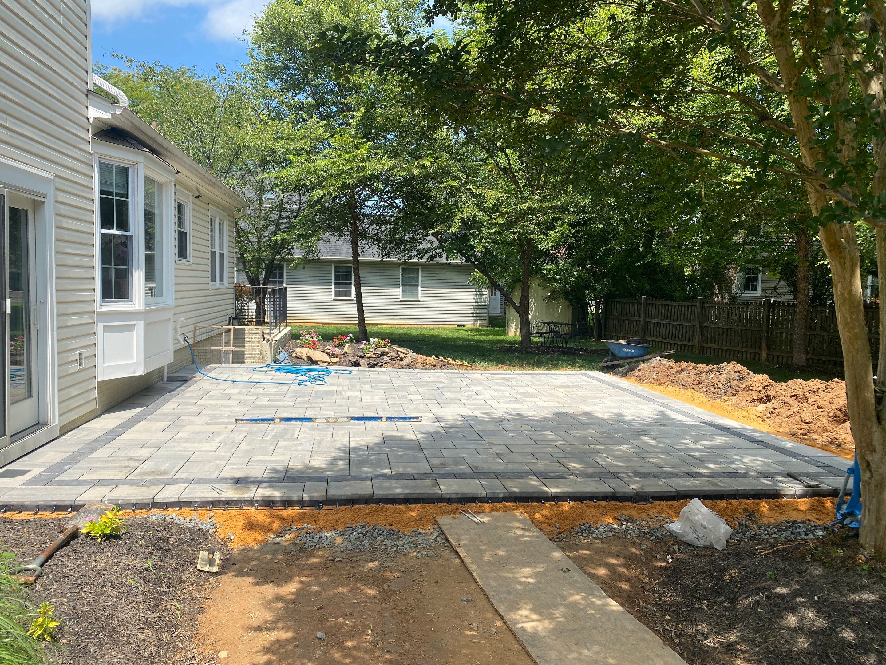 Backyard Transformation using Techo-Bloc Pavers by The Smet Companies, LLC