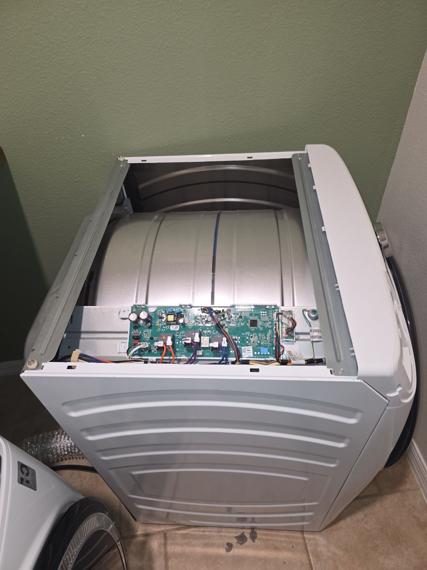 GE Front-Loading Dryer Control Board Replacement in Groveland by AMB-WORKS APPLIANCE REPAIR