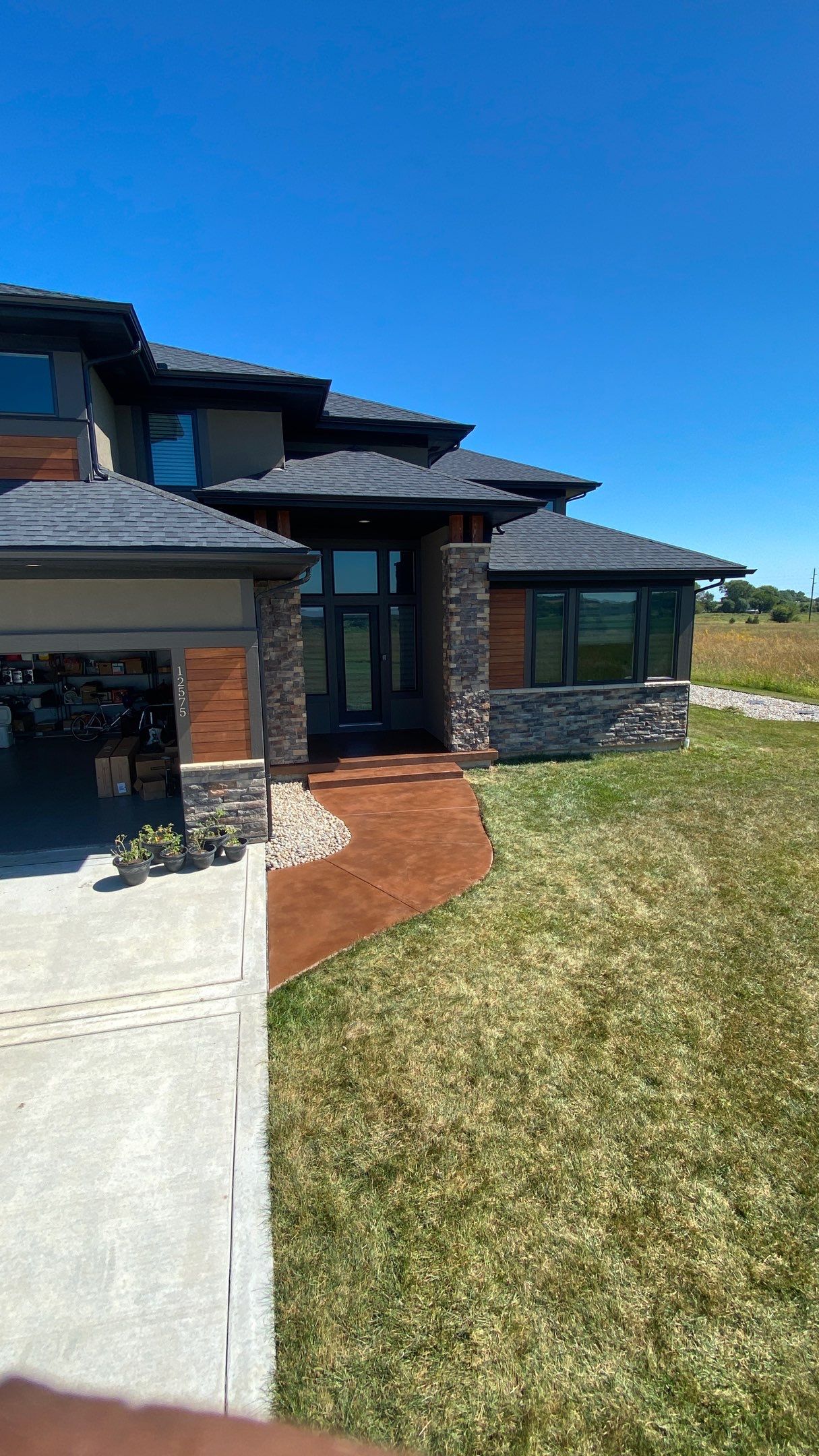 Olathe, KS -- Stoop/Sidewalk Tuscan Overlay by Big Red Decorative Concrete, LLC
